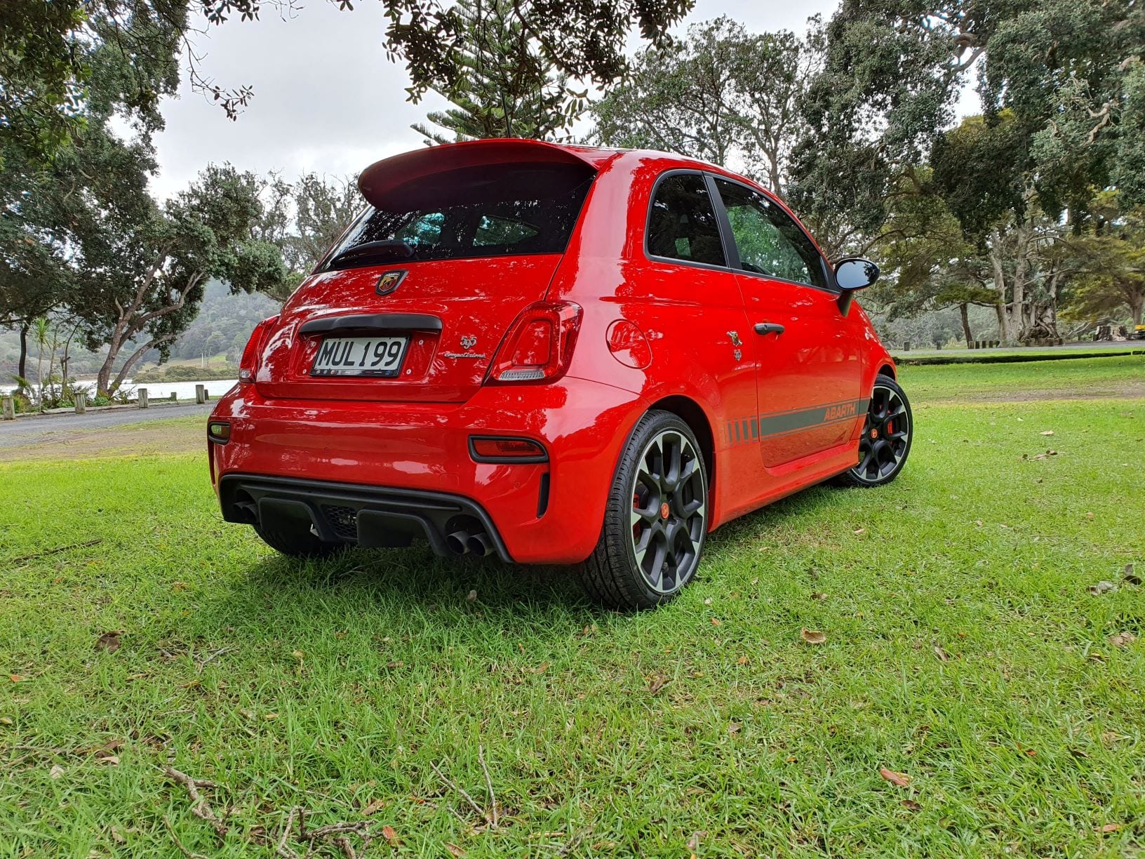A rear three quarters shot of the Abarth 595 Competizione in red.