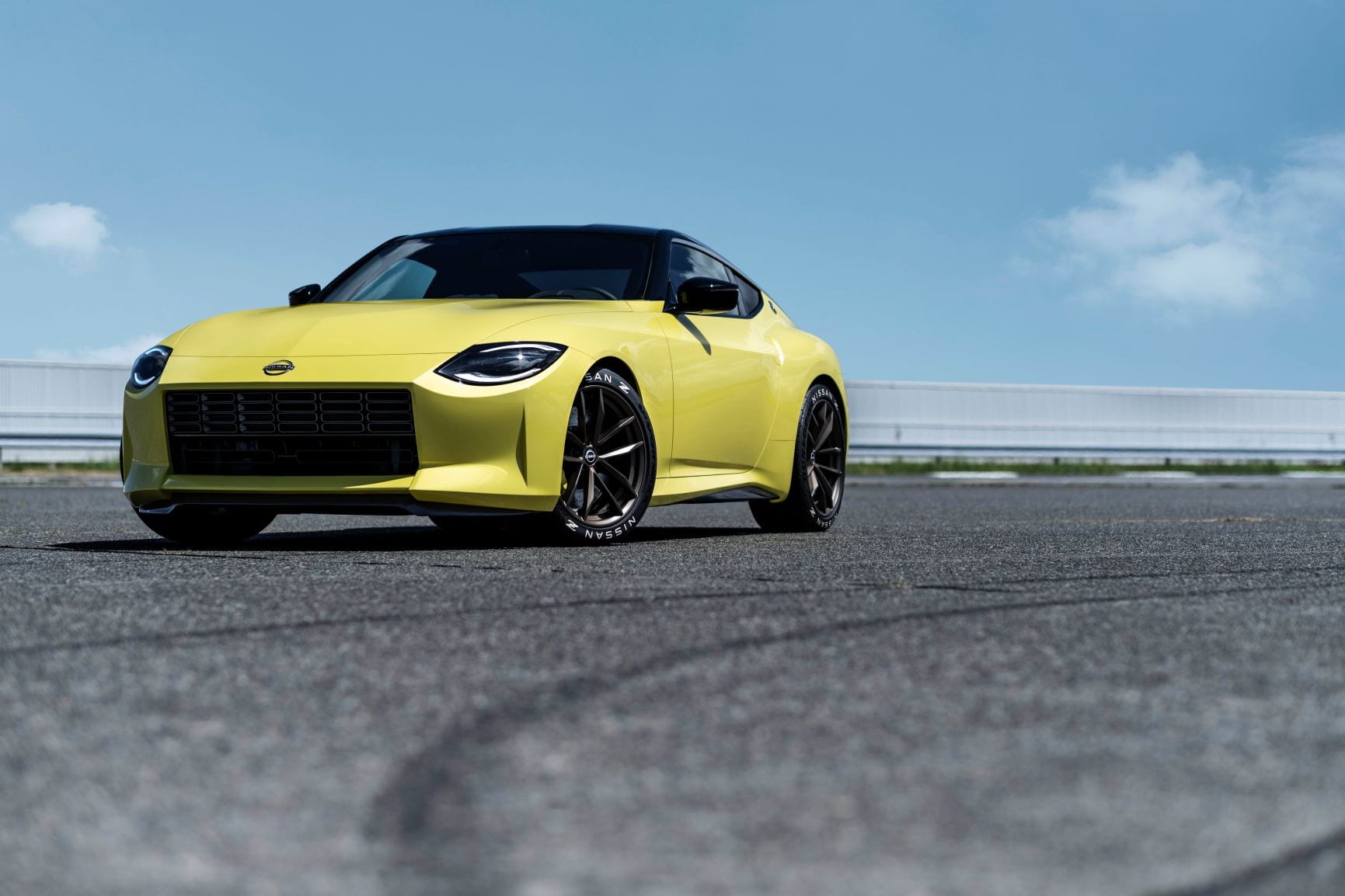 A frontal view of the Nissan Proto Z in yellow. 