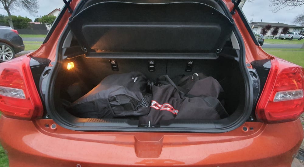 Ice hockey bag and a pram in the boot