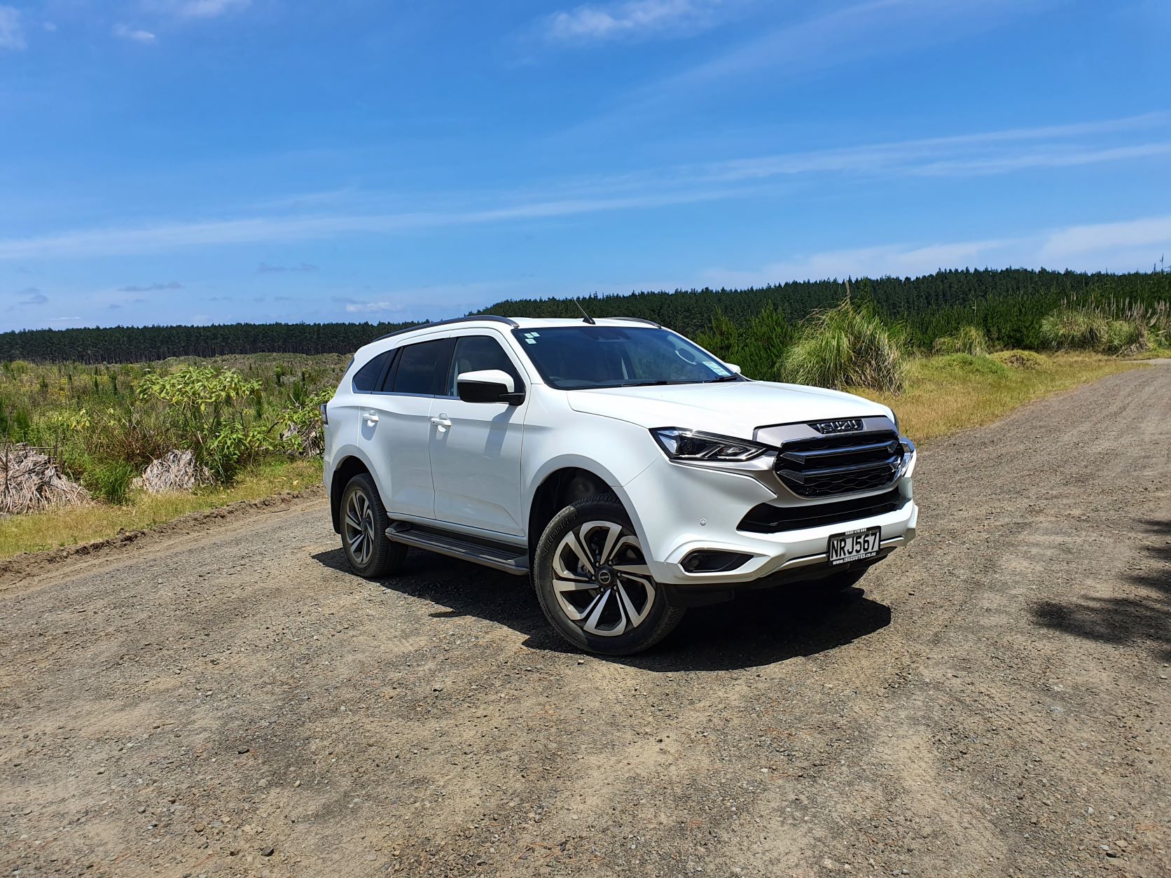 Front three quarters view of the new Isuzu MU-X in white of the