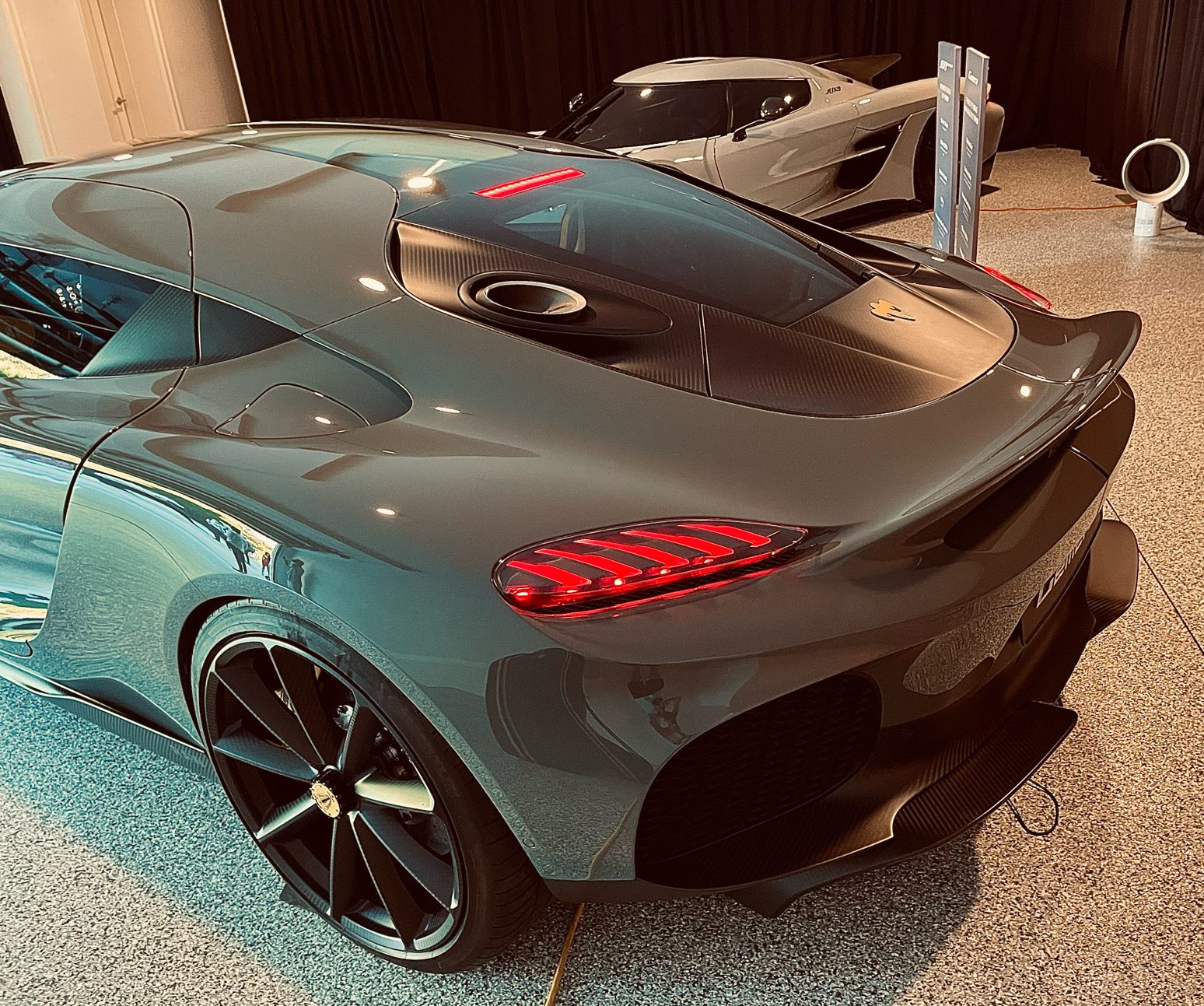Rear three quarters view of the Koenigsegg Gemera in grey