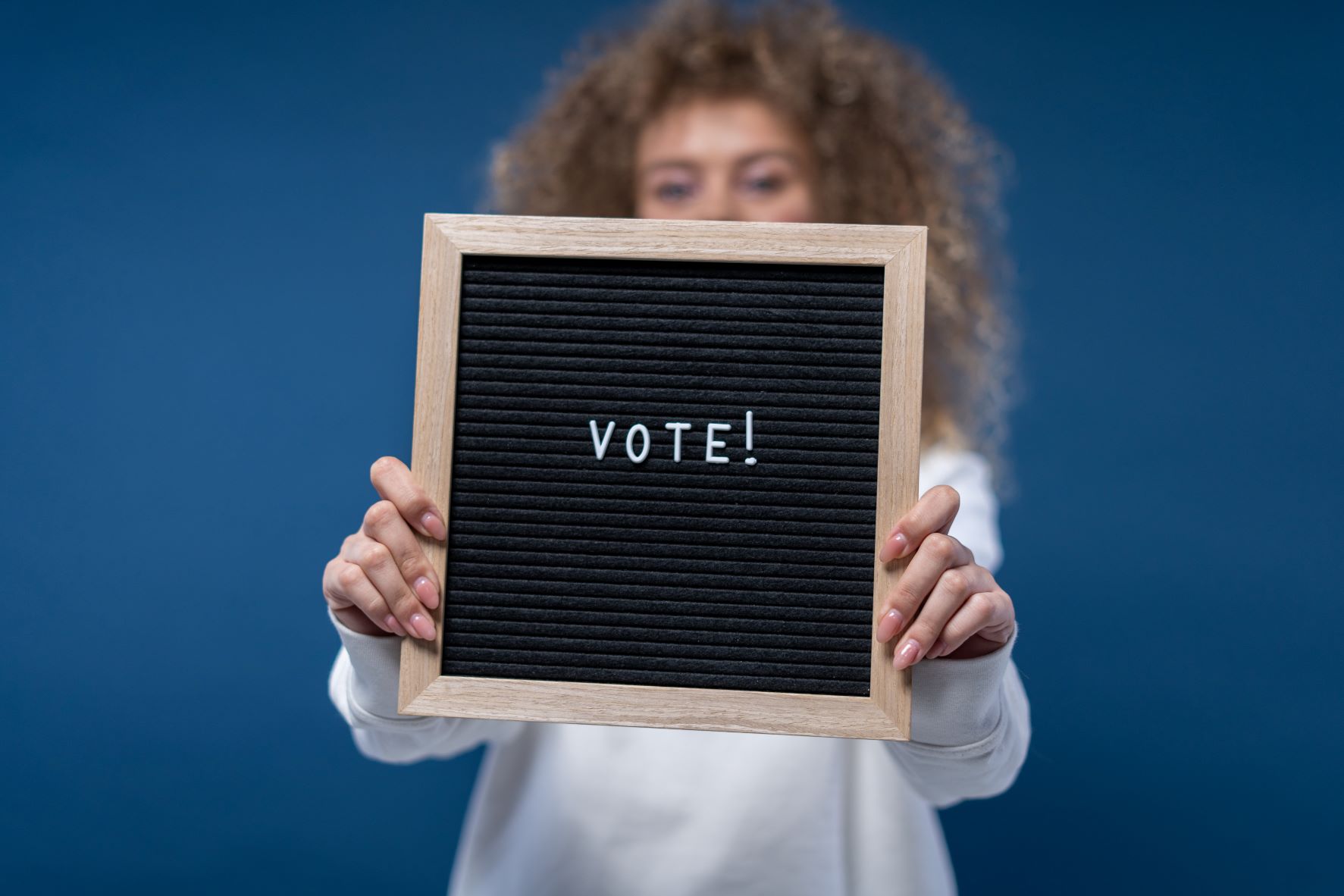 Stock photo of blackboard with vote written on it
