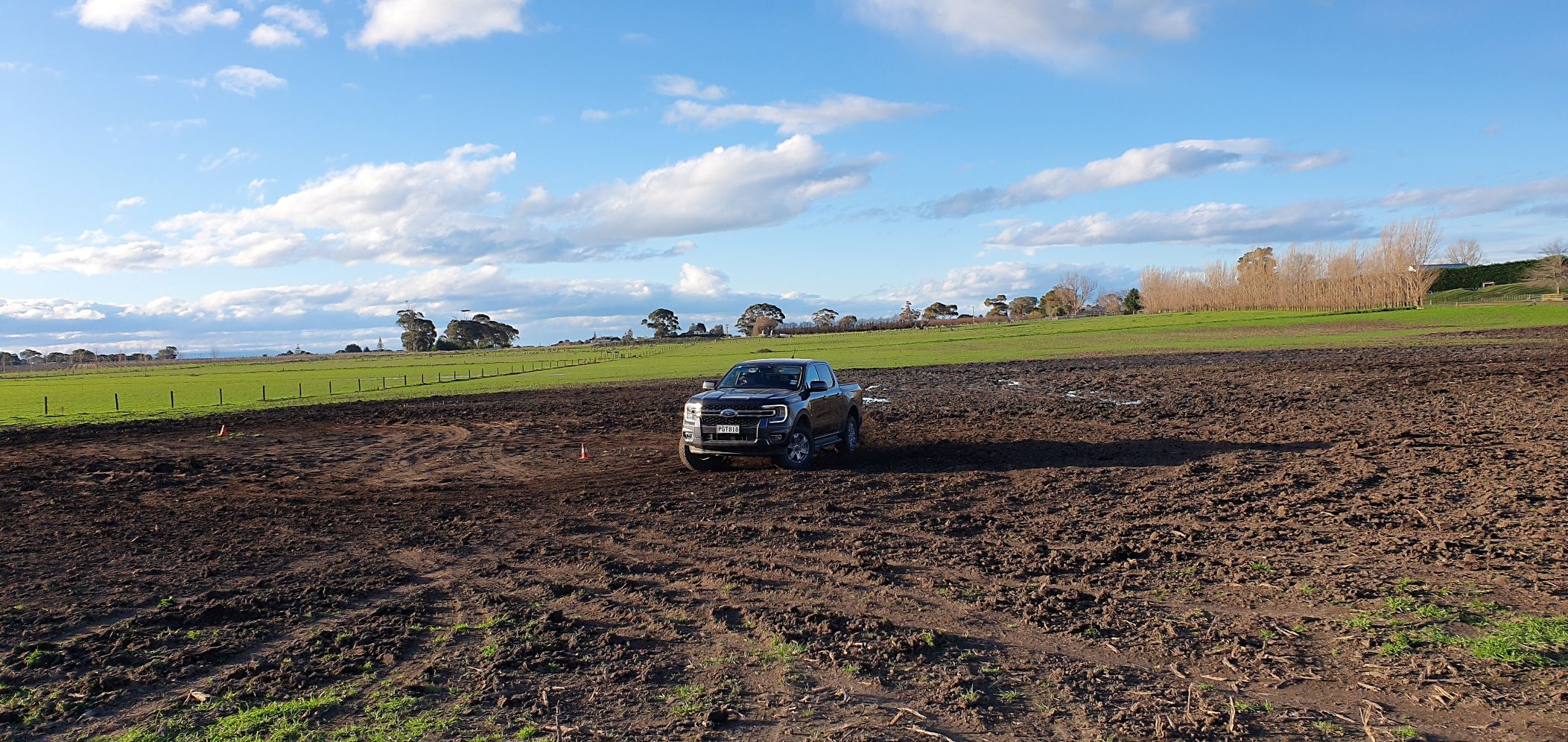 Paddock bashing in a 2022 Ford Ranger Bi-Turbo in grey. Photo taken in Havelock North, New Zealand