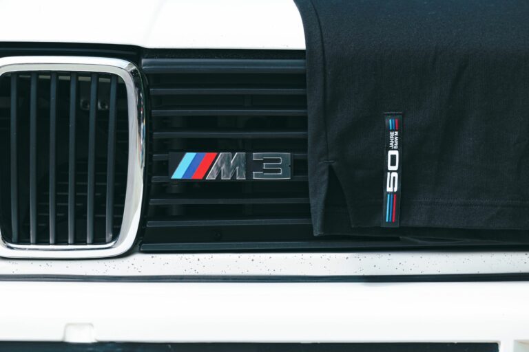 BMW 50 years of M t shirt draped over a BMW M3