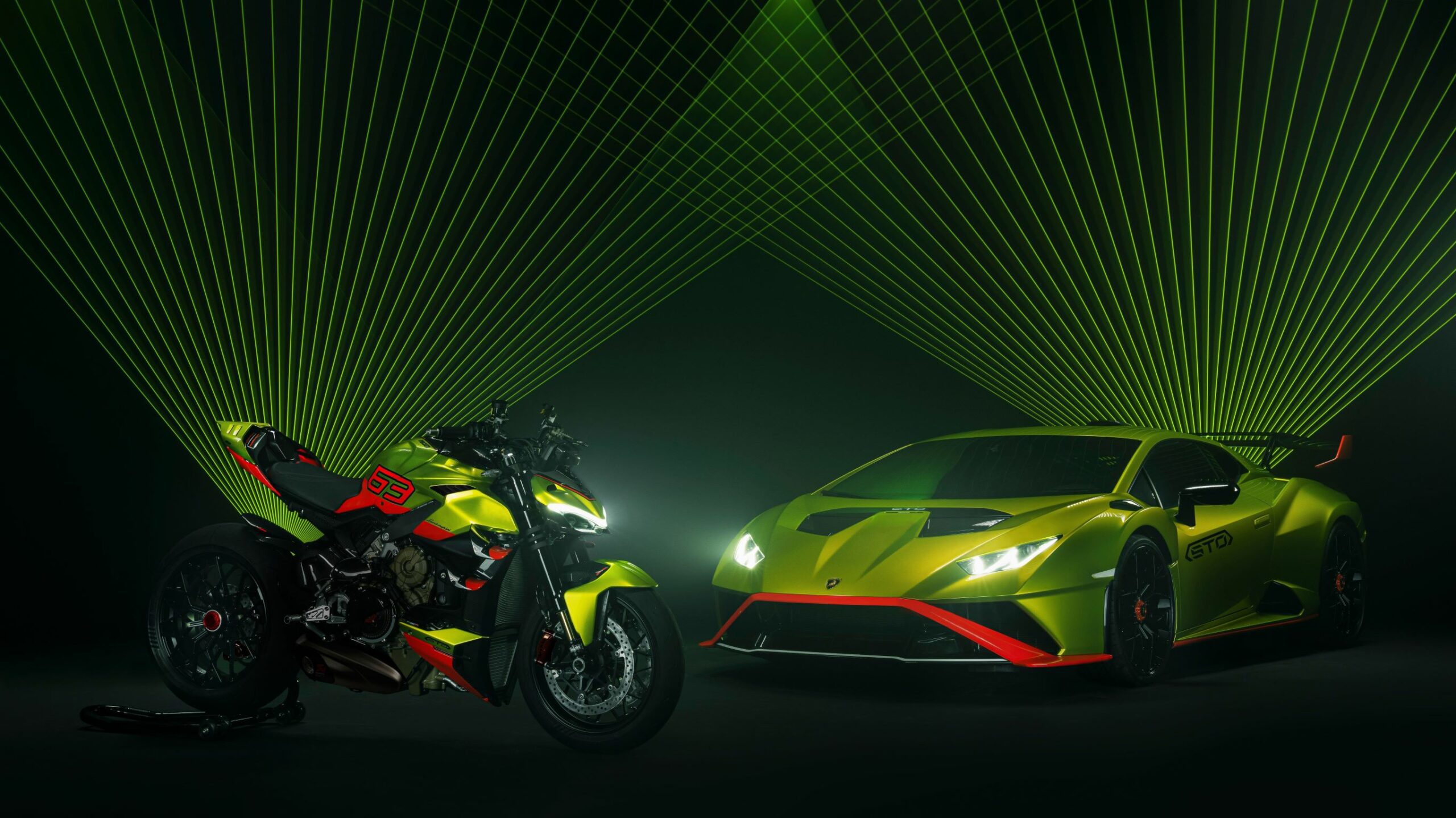 A Ducati Streetfighter V4 Lamborghini in green and a Lamborghini Huracan STO in green