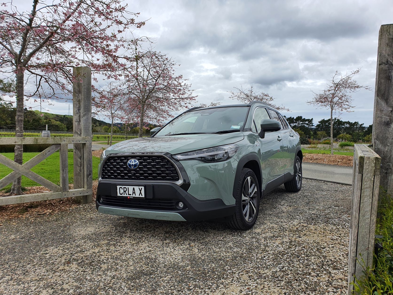 The top-spec Toyota Corolla Cross Hybrid Limited AWD in Safari Green