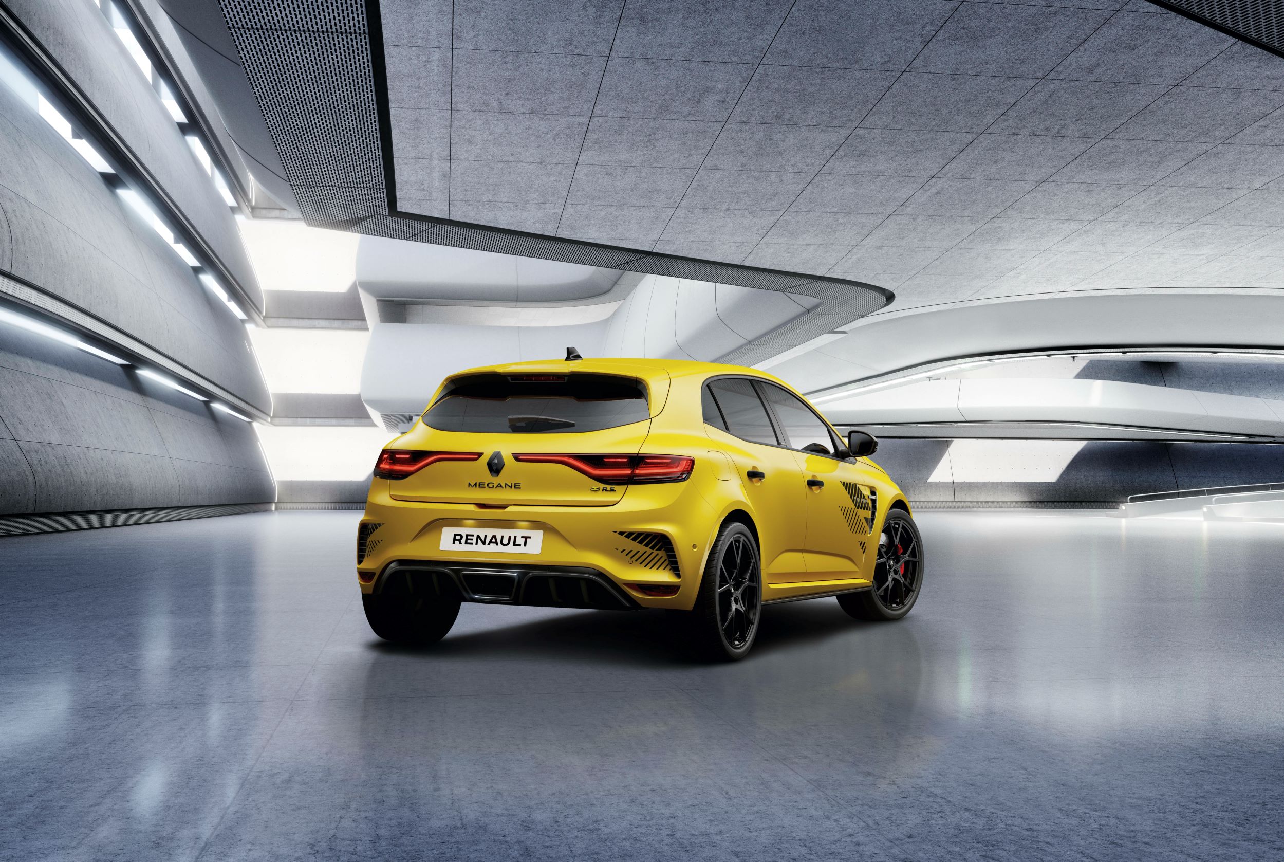 Rear three quarters view of a Renault Megane R.S. Ultime in Yellow.