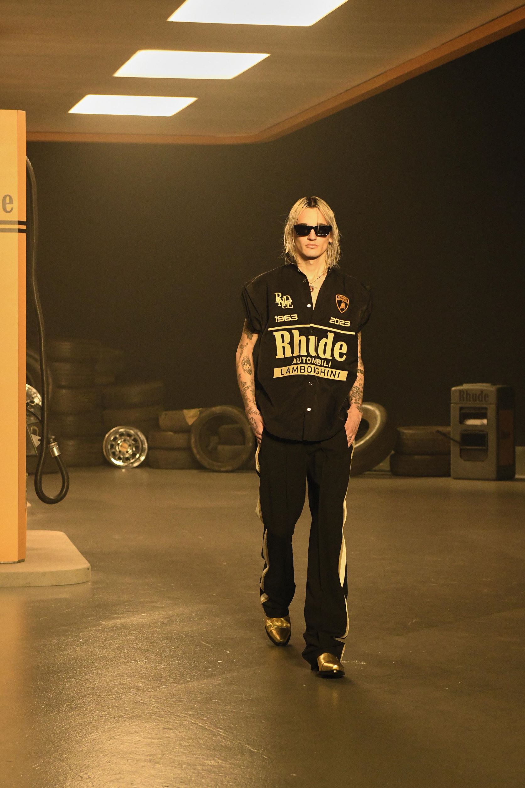 A model wearing a Rhude x Lamborghini collection shirt at the unveiling of the collaboration.