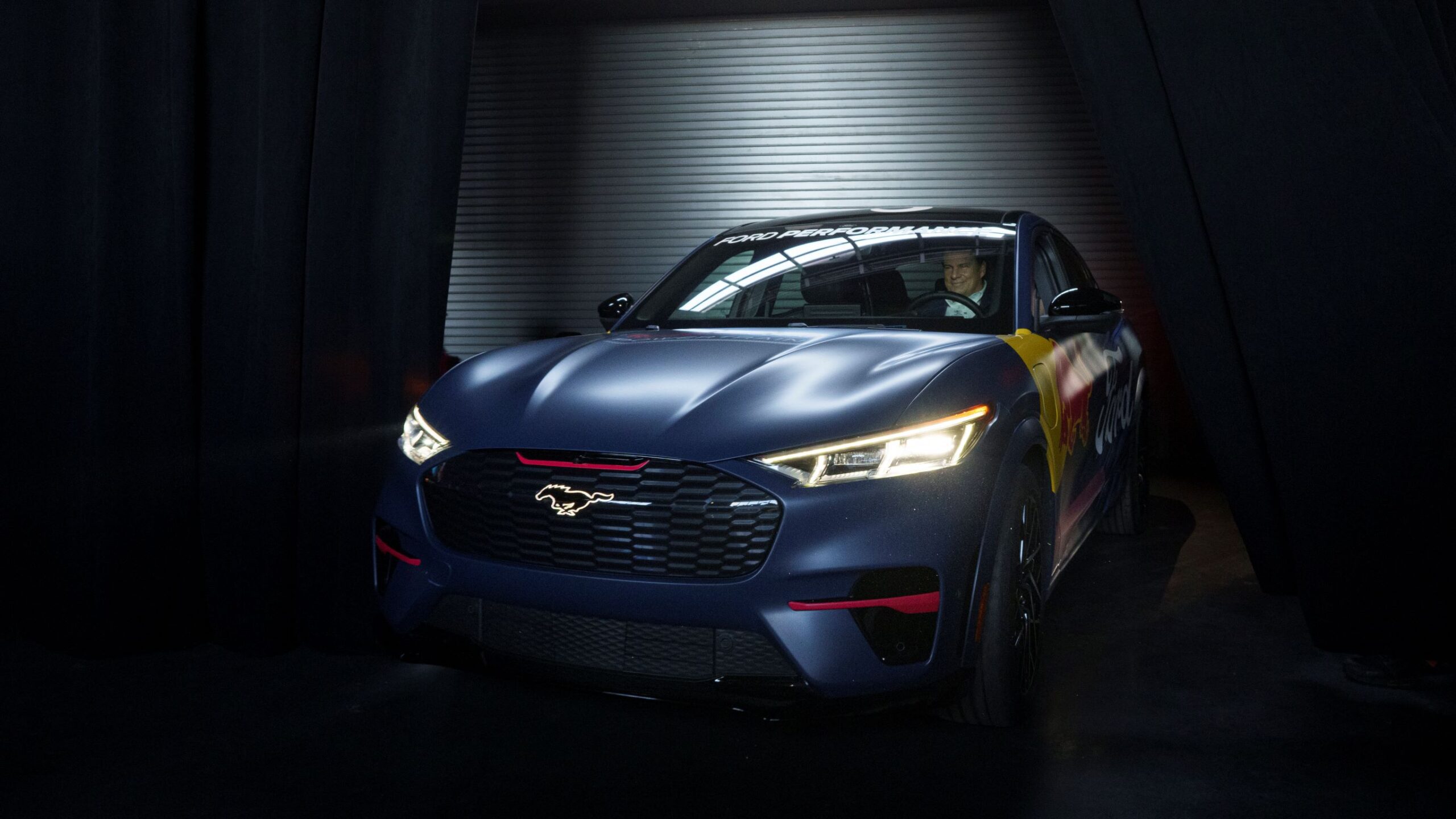 A Ford Mustang Mach E-1400 prototype pictured in a Red Bull livery