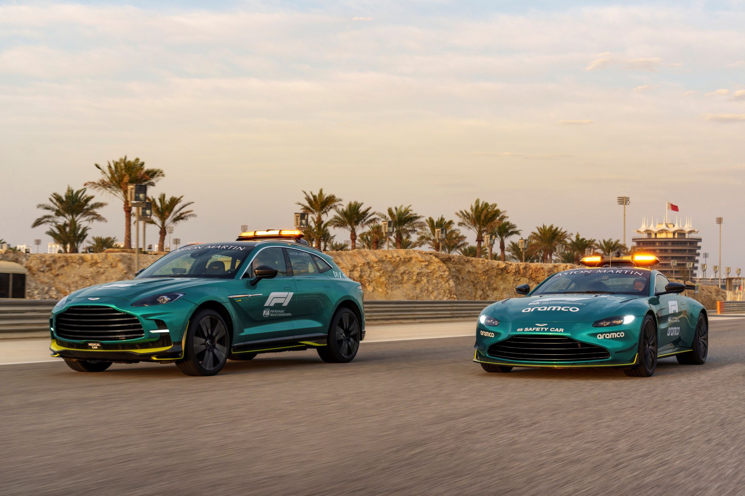 Front three quarters motion shot of the Aston Martin DBX707 Medical Car and Aston Martin Vantage Safety Car for Formula One