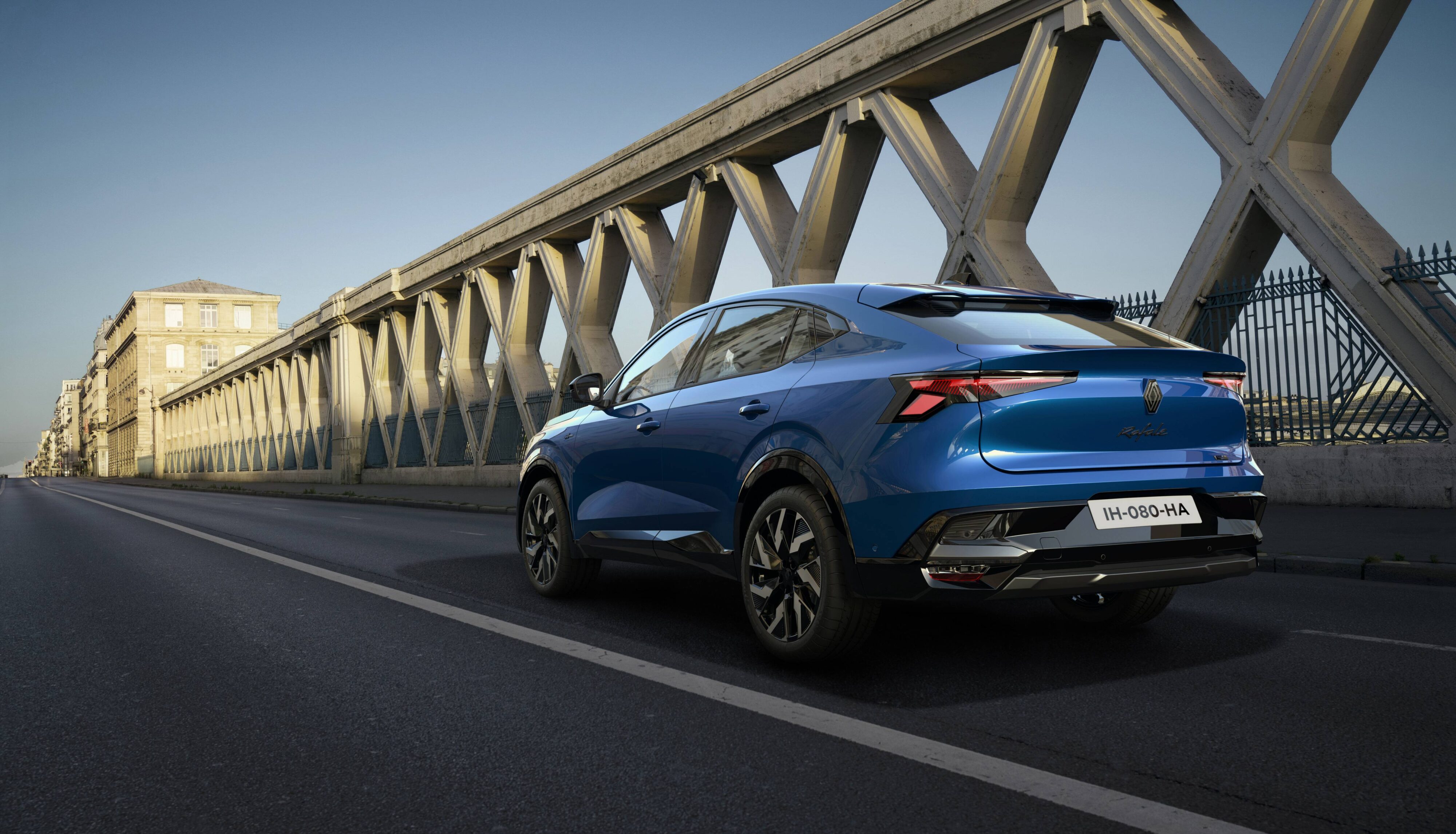 Rear three quarters view of the Renault Rafale SUV in Alpine Blue