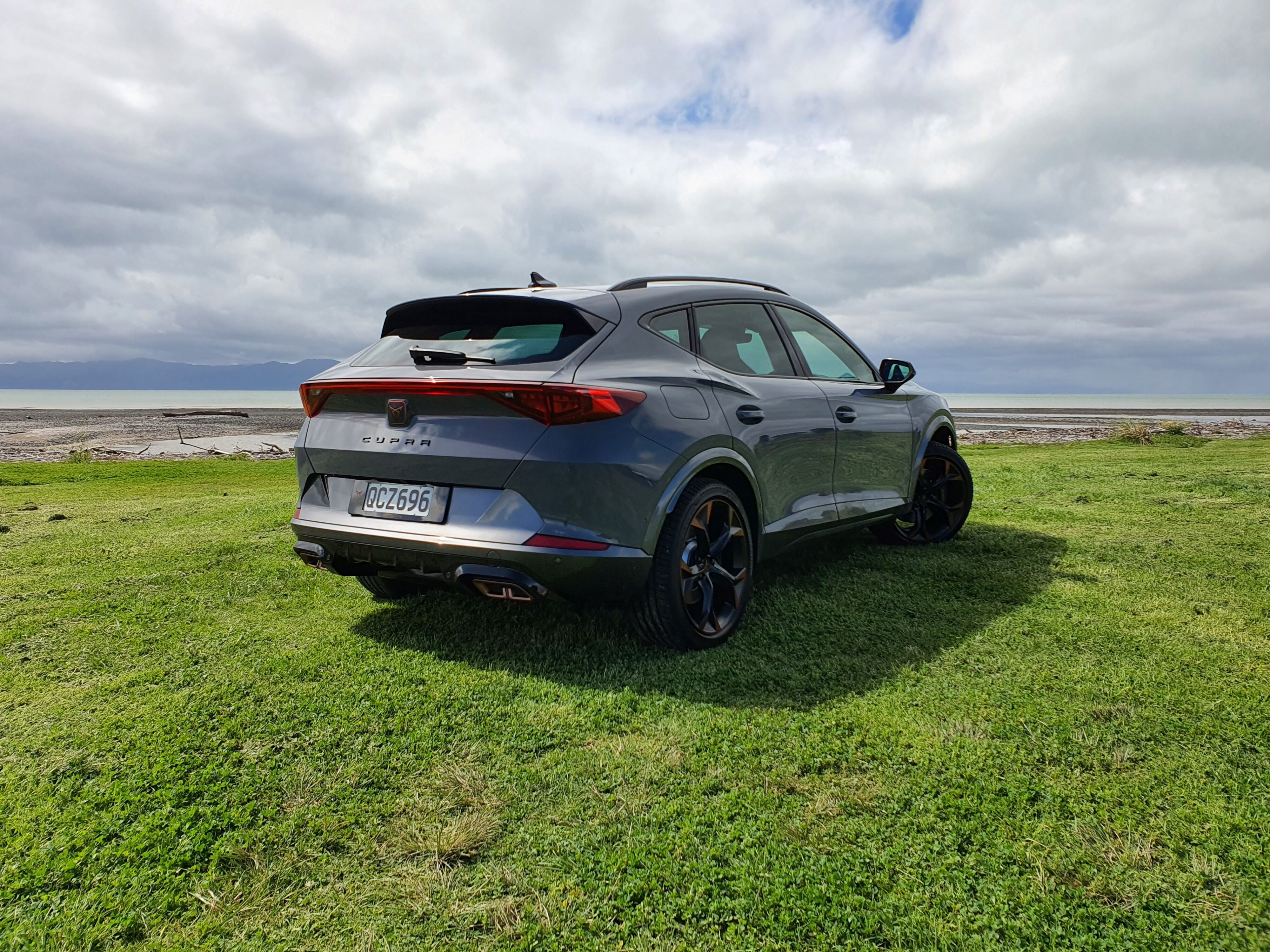 Rear three quarters view of the 2023 Cupra Formentor V e-Hybrid.