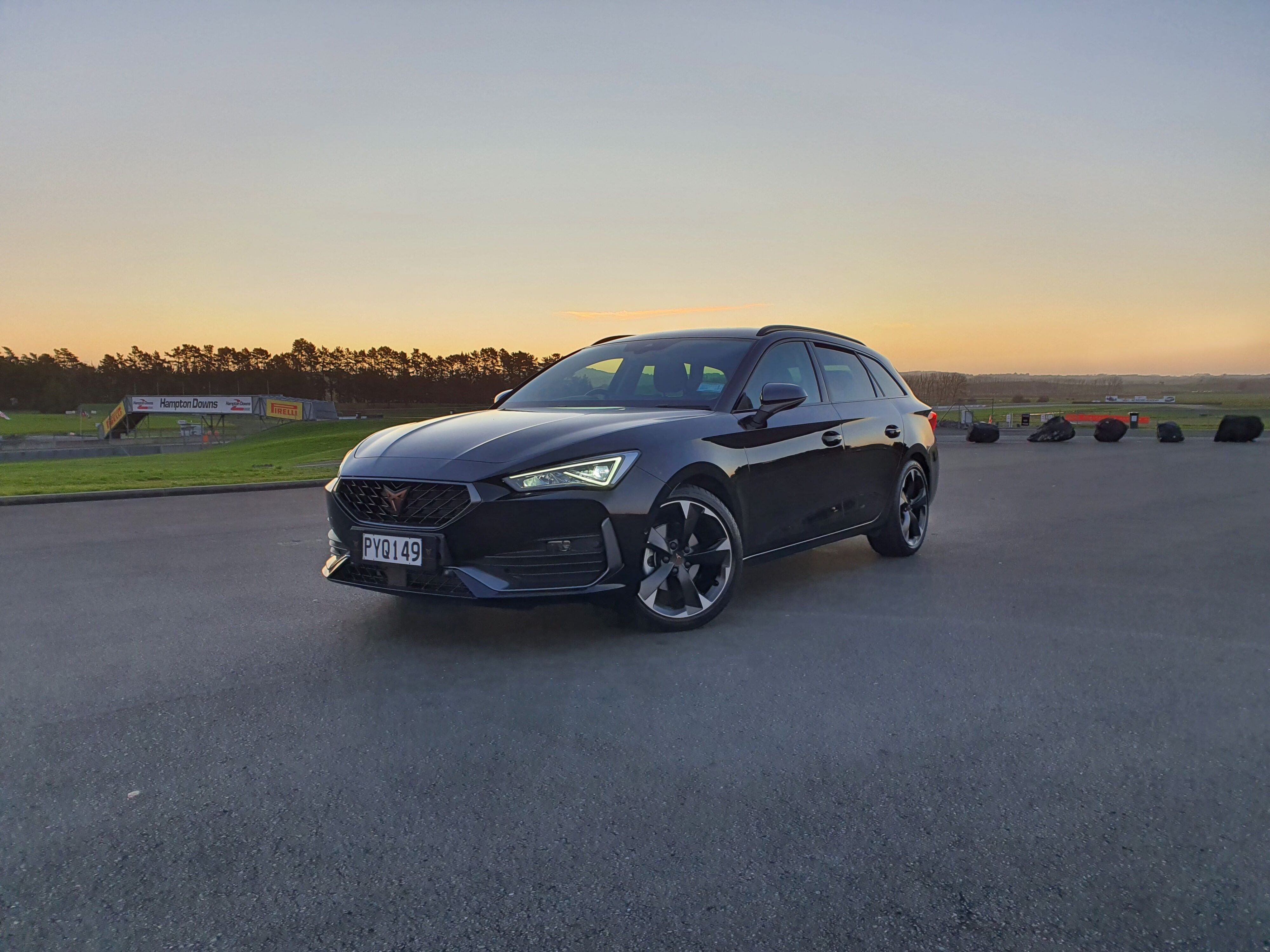 Front three quarters view of a Black 2023 Cupra Leon V Sports Tourer.