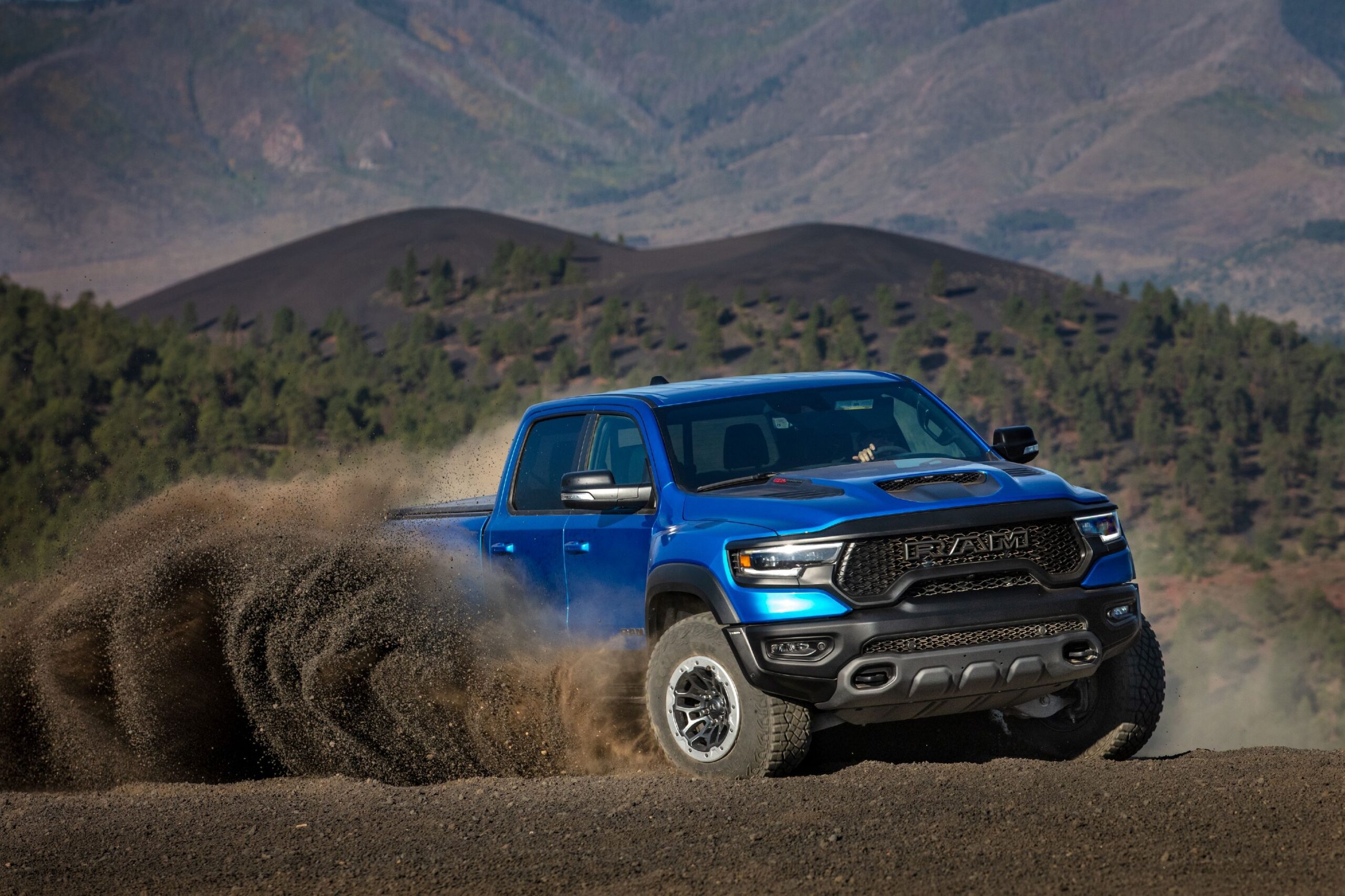 Front three quarters view of a 2024 RAM 1500 TRX Final Edition in motion.