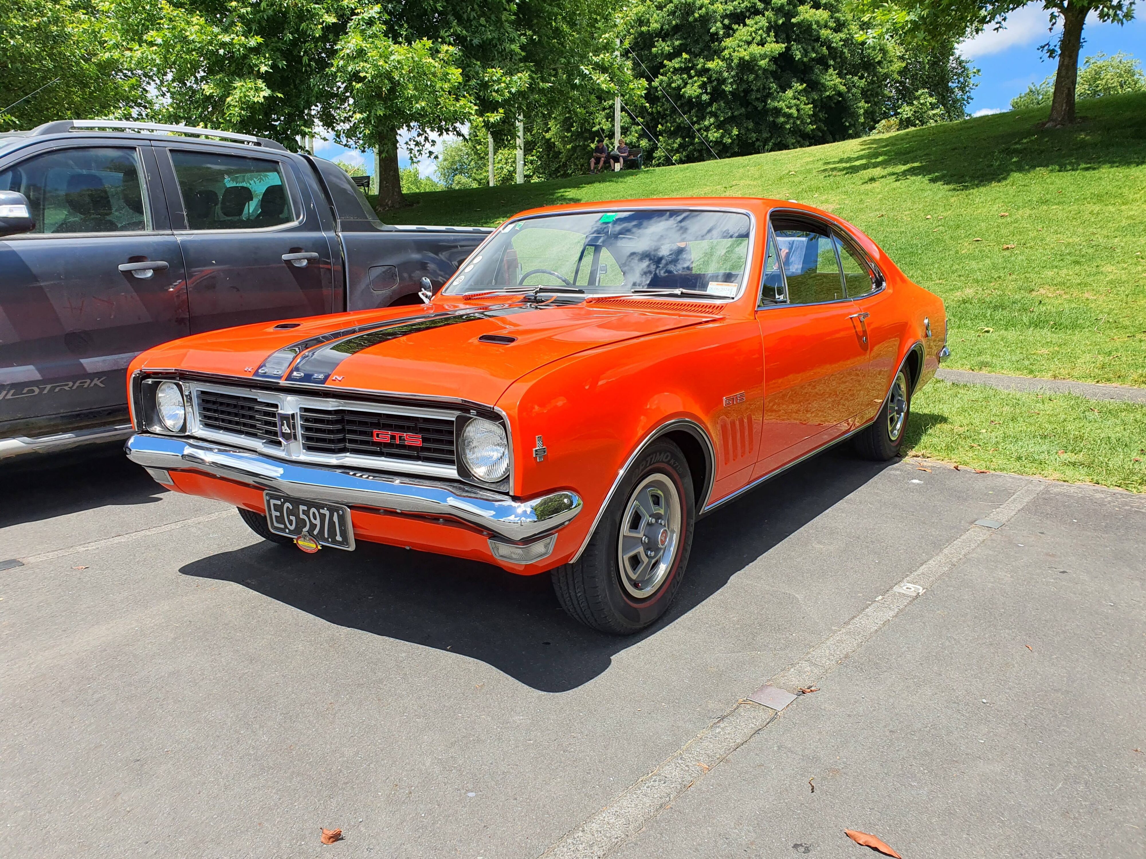 Photo of an orange 1969 Holden Monaro.