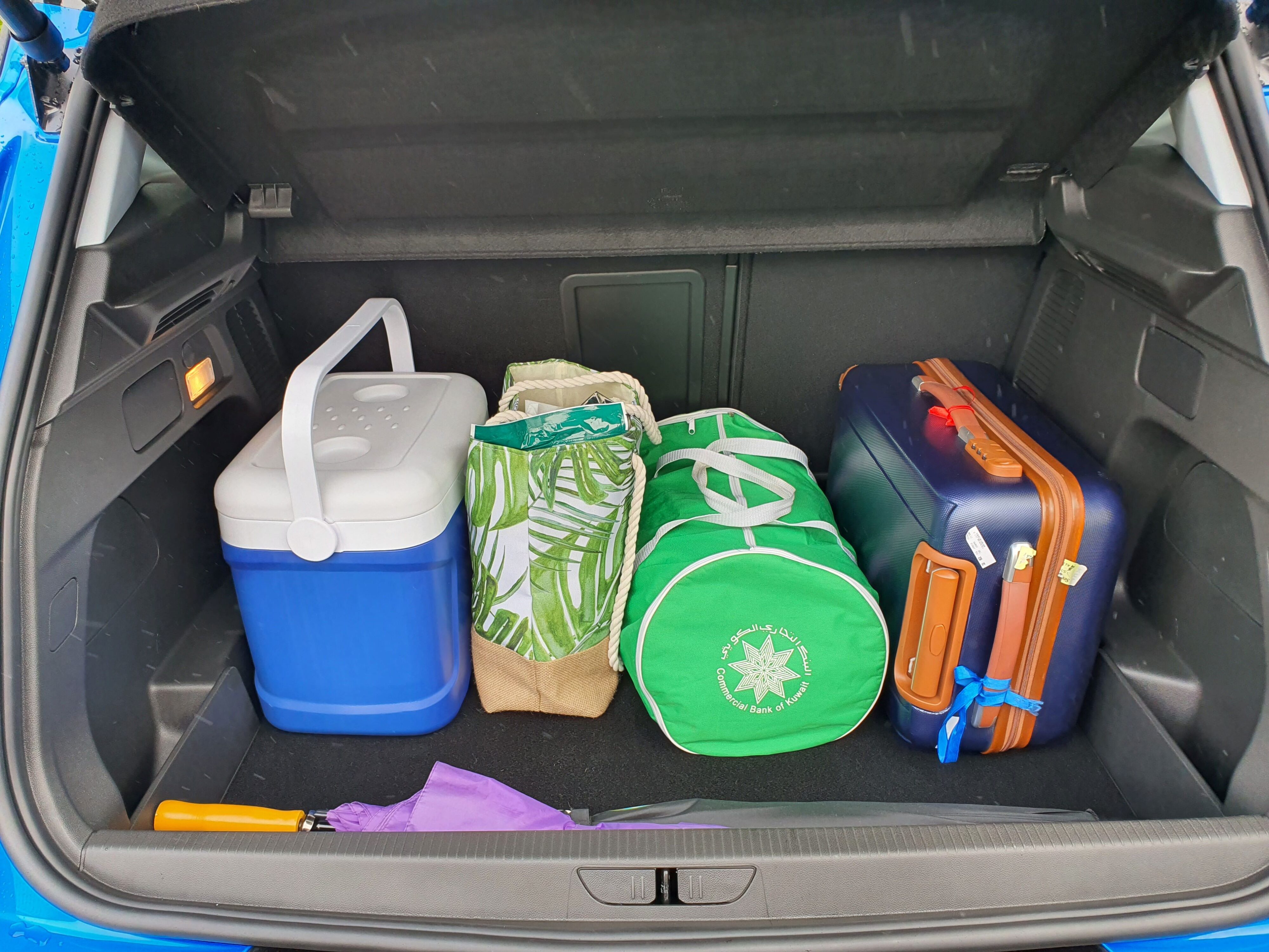Luggage packed in the boot of a 2023 Opel Grandland SRi.