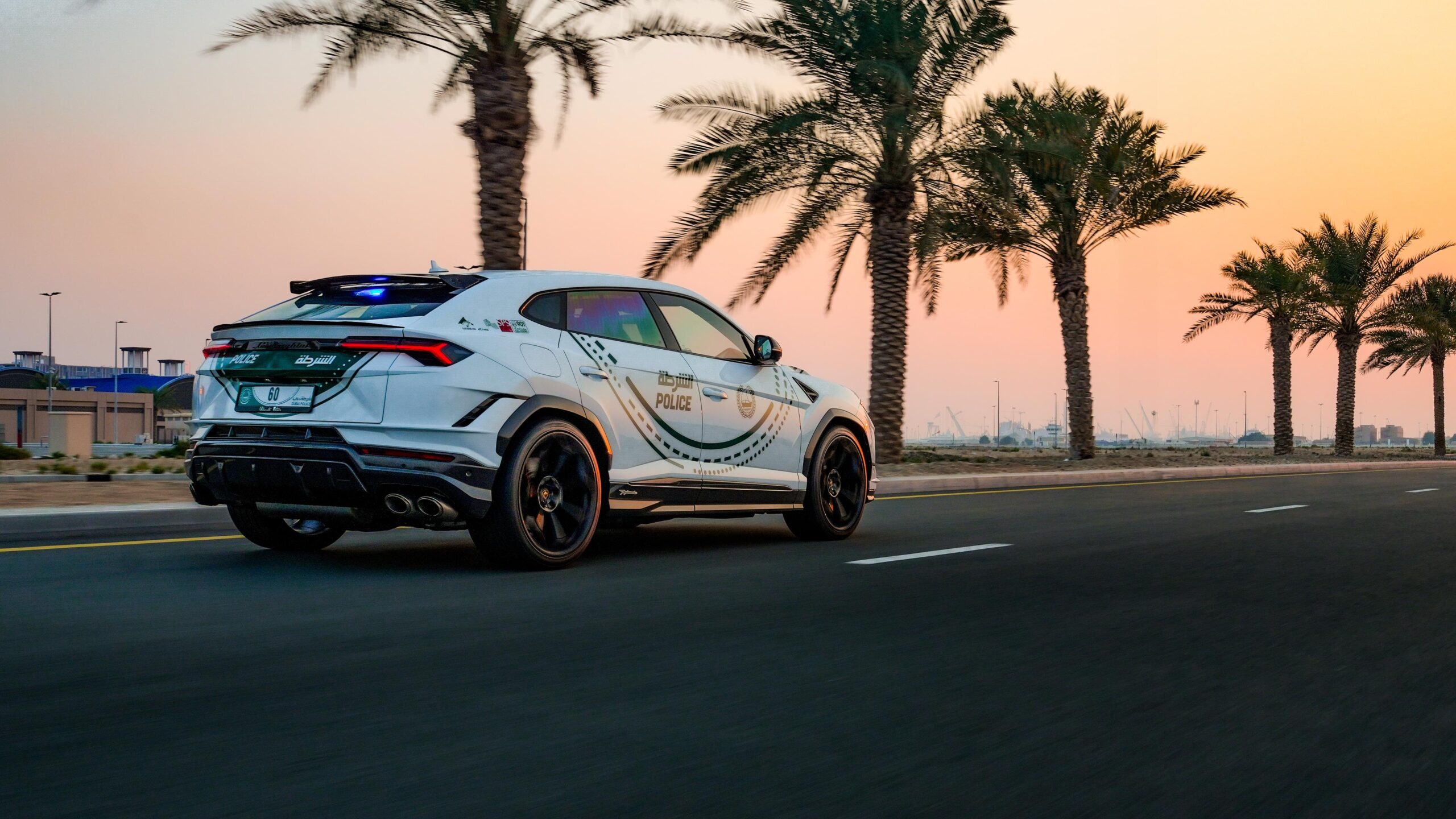 Rear three quarters photo of a Dubai Police liveried Lamborghini Urus Performante.