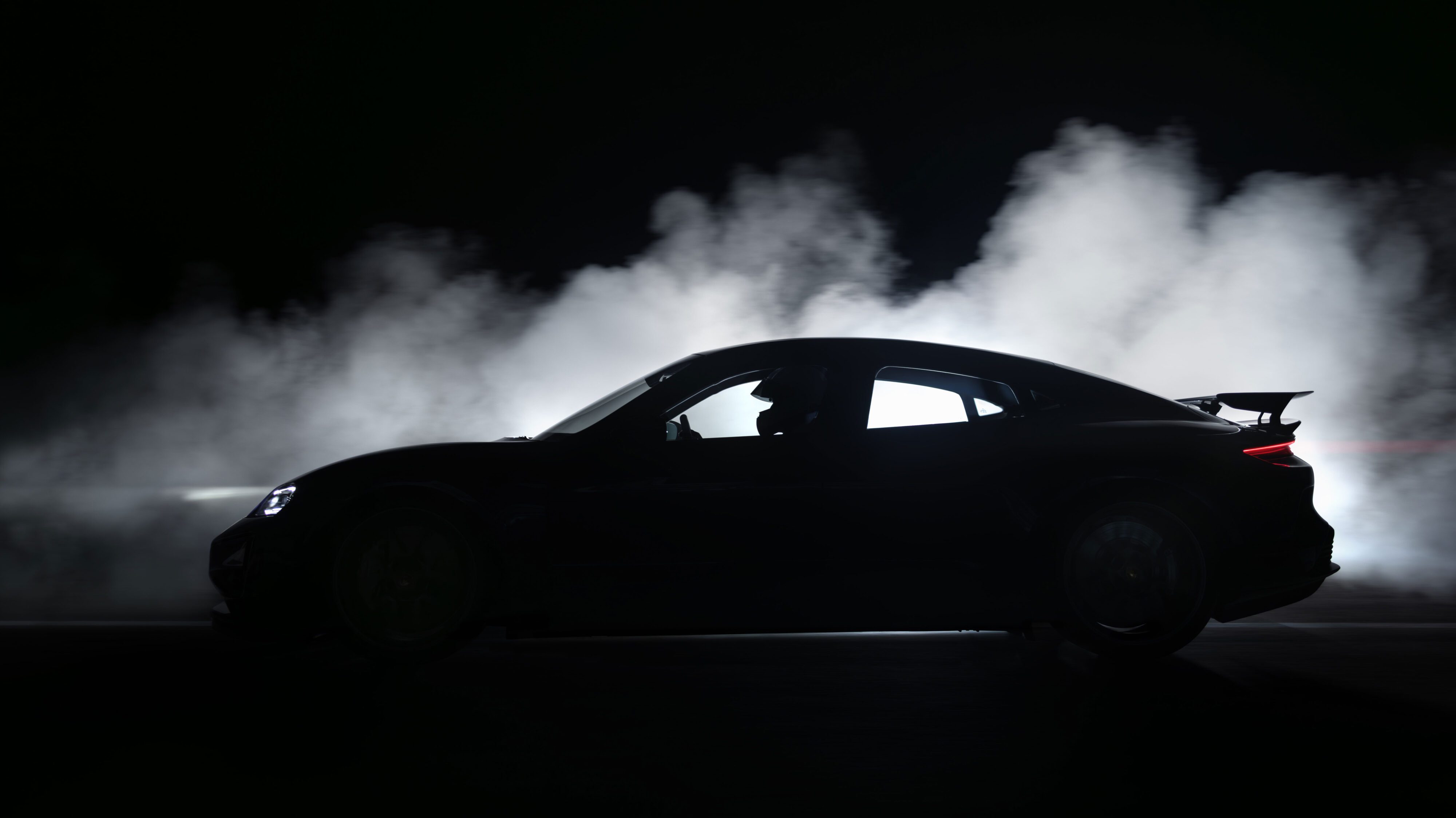 Teaser image of the silhouette of the upcoming Porsche Taycan.