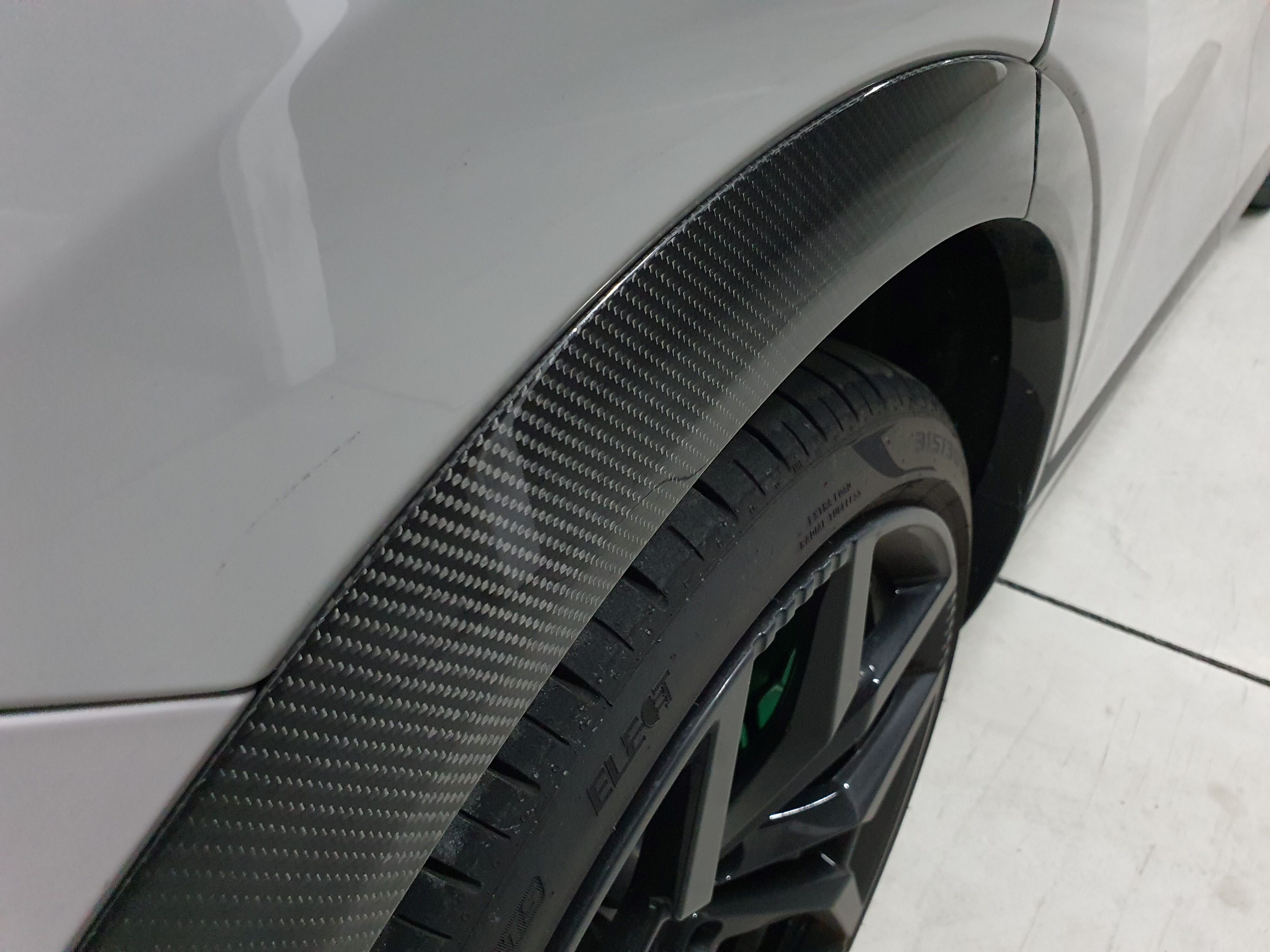 Carbon fibre wheel arches on a 2024 Lotus Eletre R.