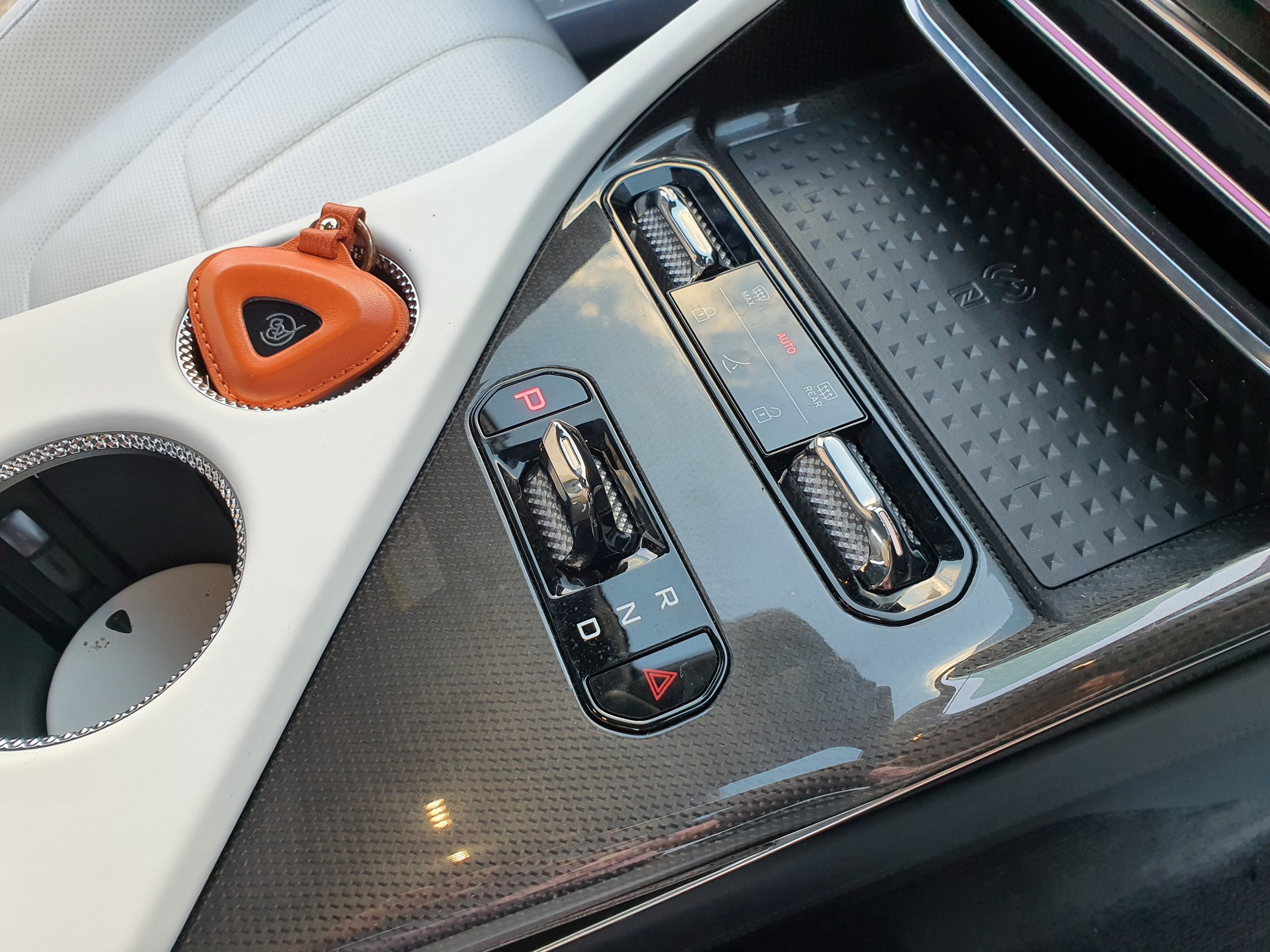 Carbon fibre inserts on the centre console of a 2024 Lotus Eletre S.