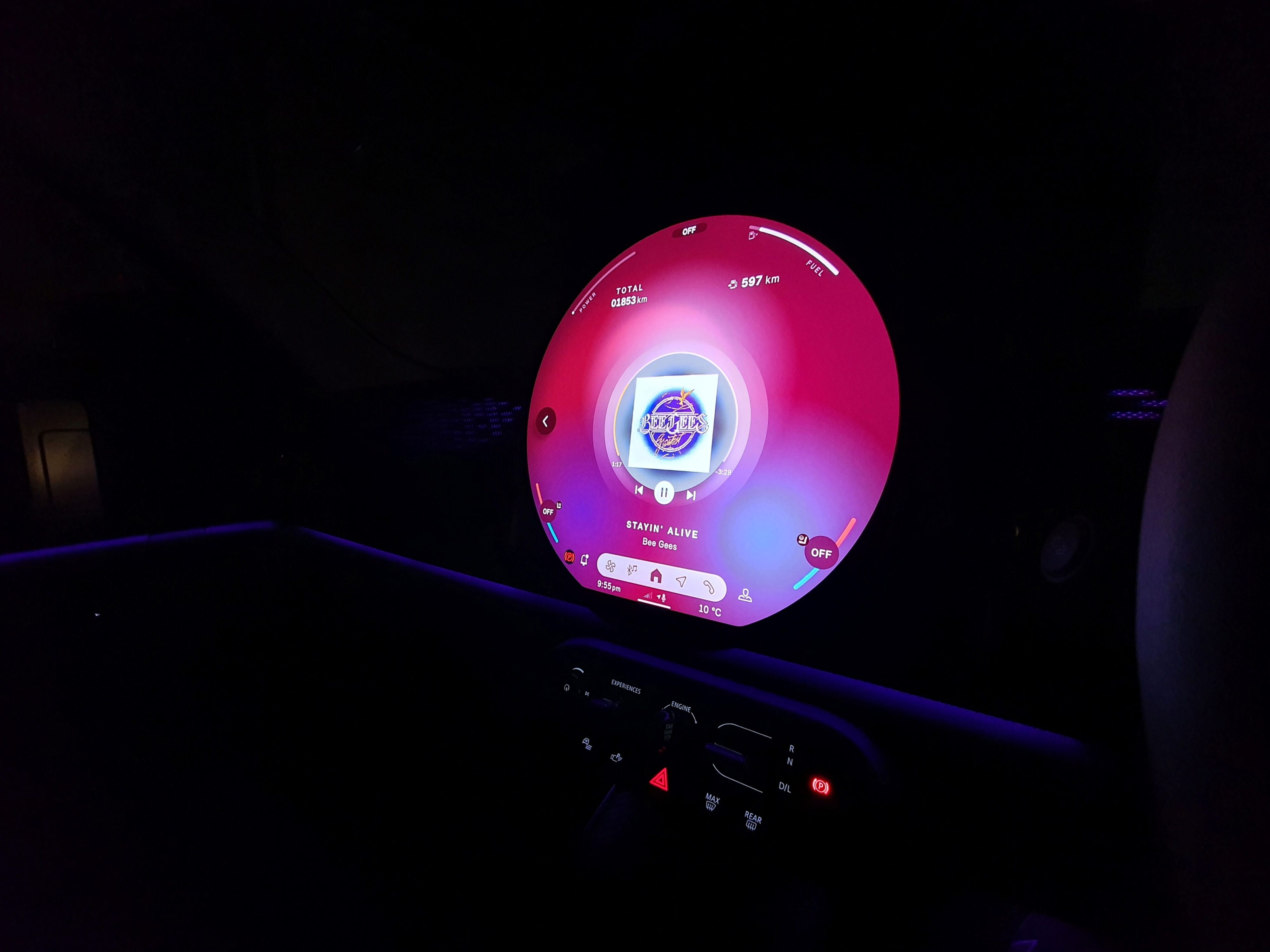 Central screen lit up at night on the interior of a 2024 Mini Countryman C Classic.