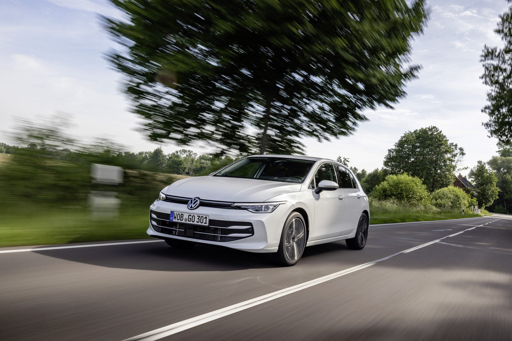 A promotional photo of a MK8 Volkswagen Golf in motion