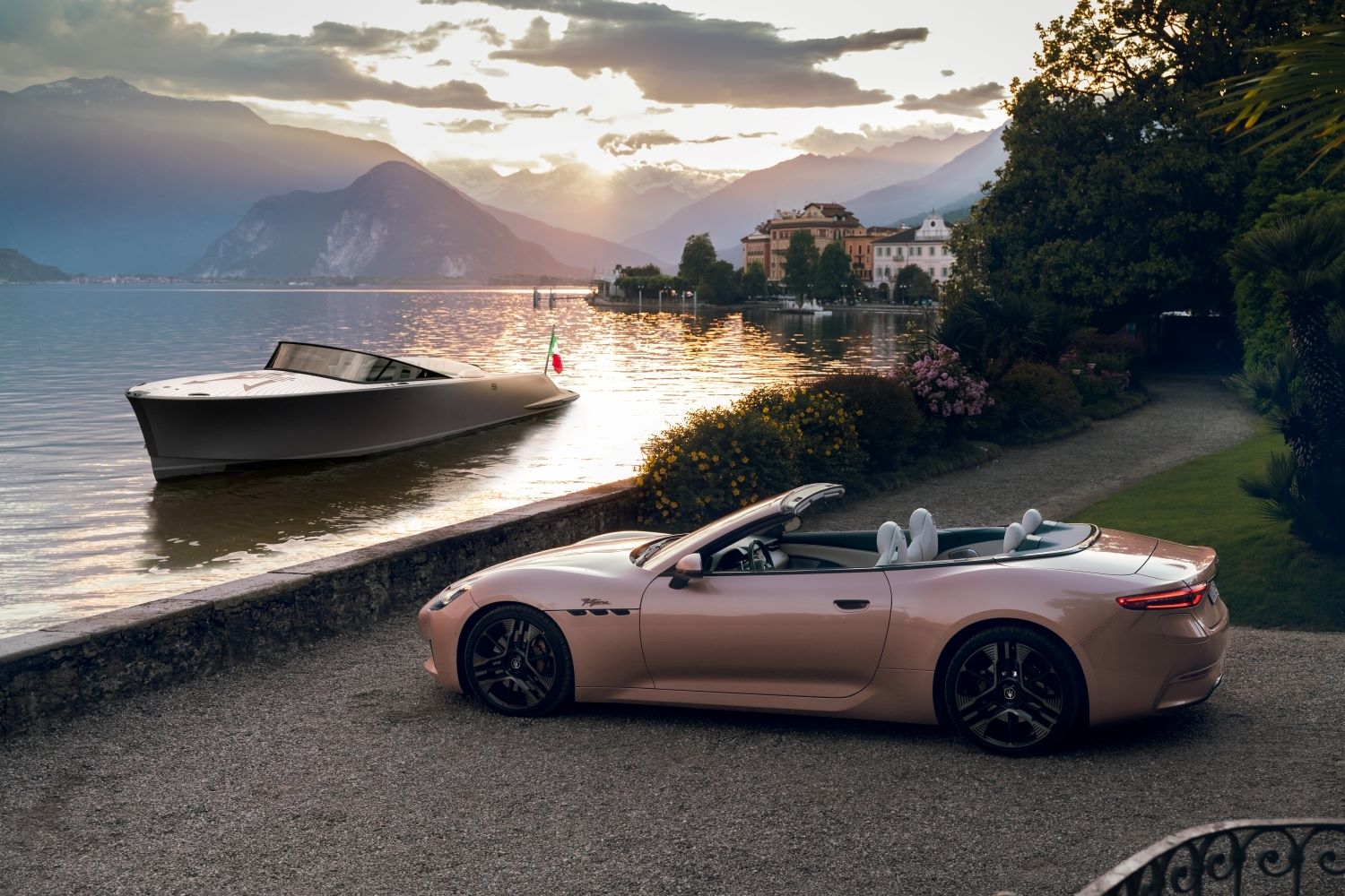 A Maserati GranCabrio Folgore and a Tridente powerboat on the shores of Lake Maggiore.