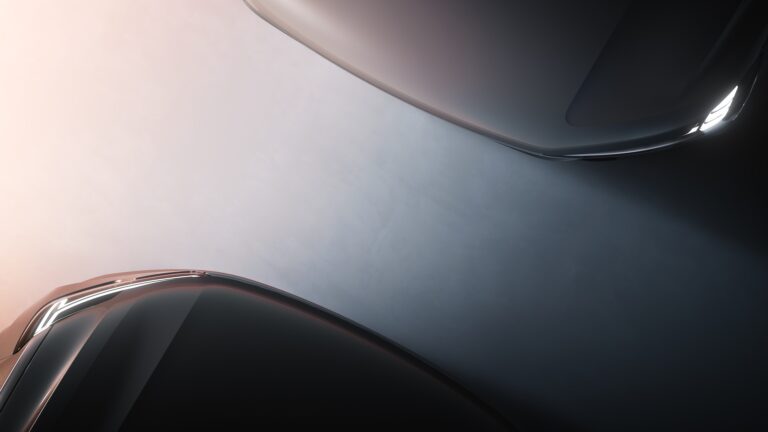 A teaser image of the new Volvo EX90 and XC90 taken from above.