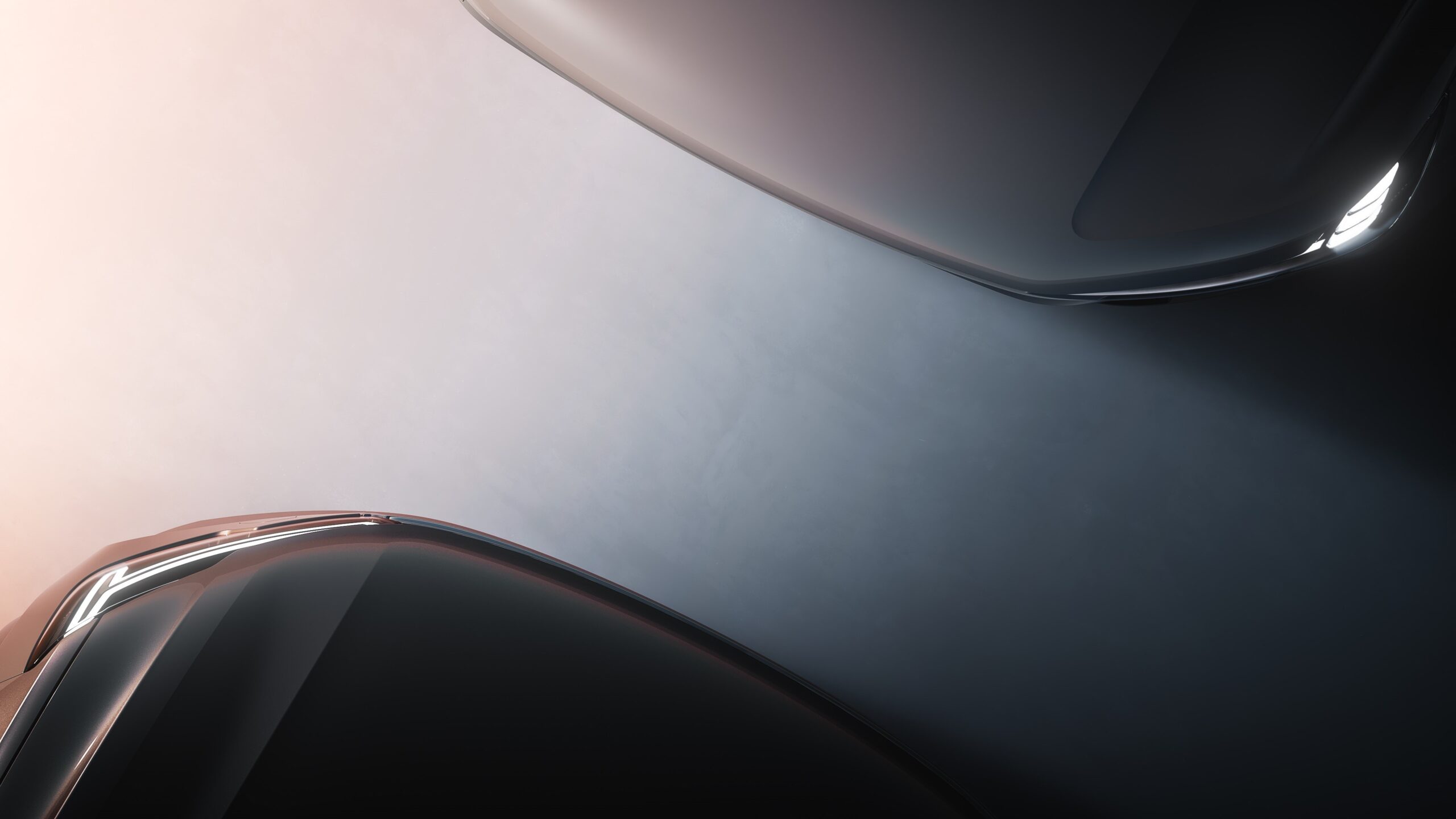A teaser image of the new Volvo EX90 and XC90 taken from above.