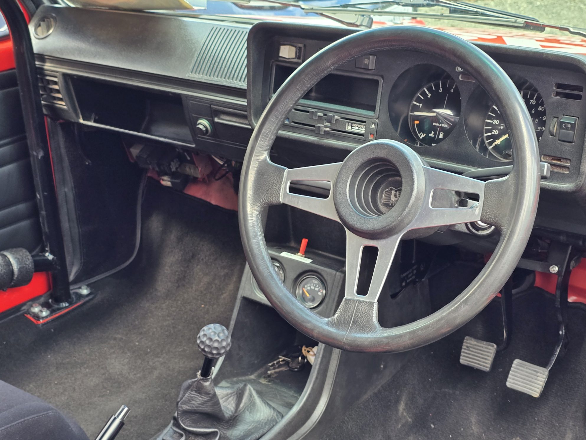 Giltrap's red Mk1 Golf NZ