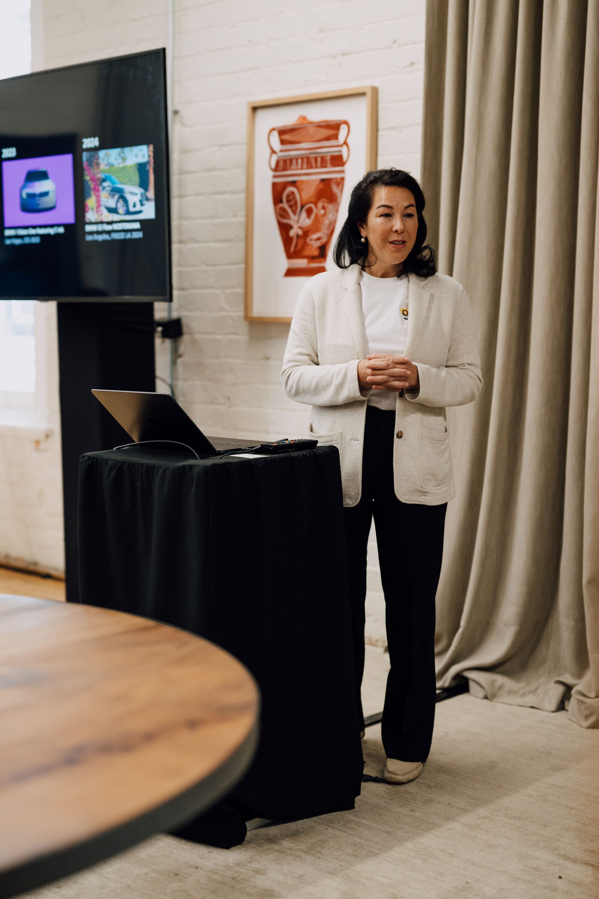 Dr. Stella Clarke speaking to a room of journalists at The Hotel Britomart in Auckland, New Zealand.