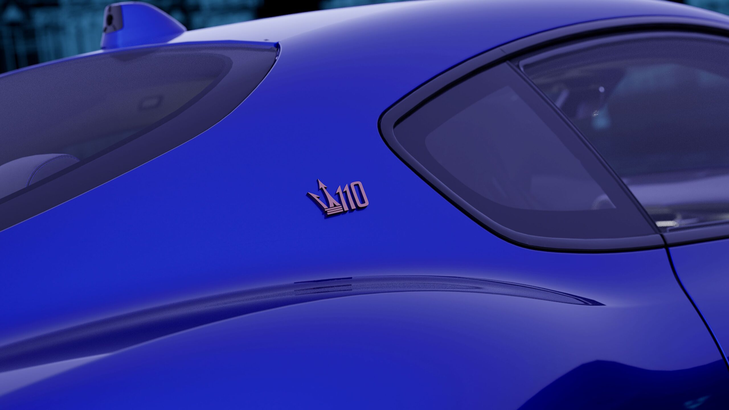 110 Anniversario badge on the rear three quarters of a Maserati GranTurismo Folgore.