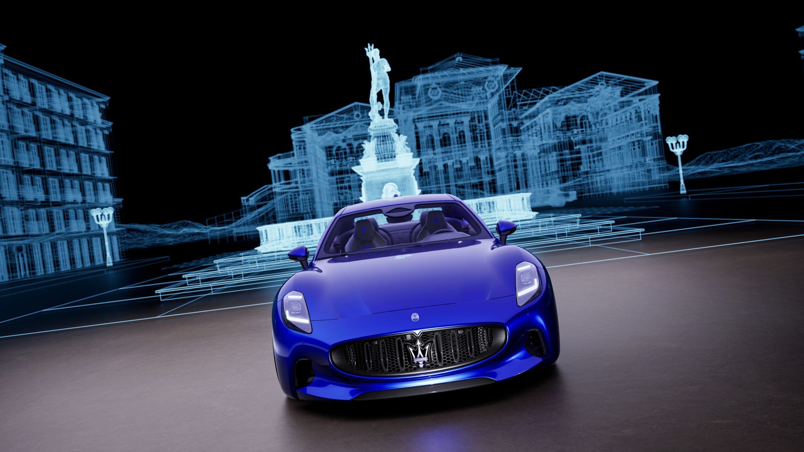 A photo of a limited run 110 Anniversario Maserati GranTurismo in front of the Trident's home.