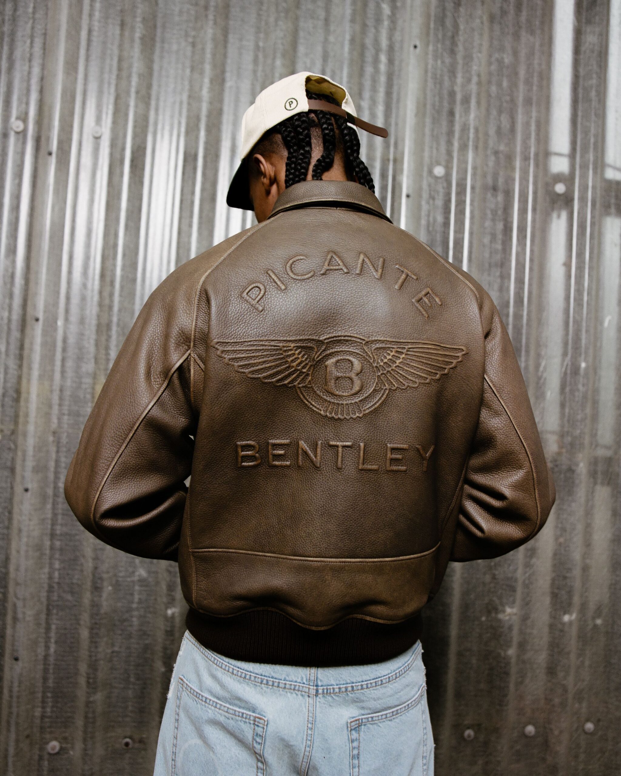 A model poses with the Bentley and Picante Bomber Jacket.