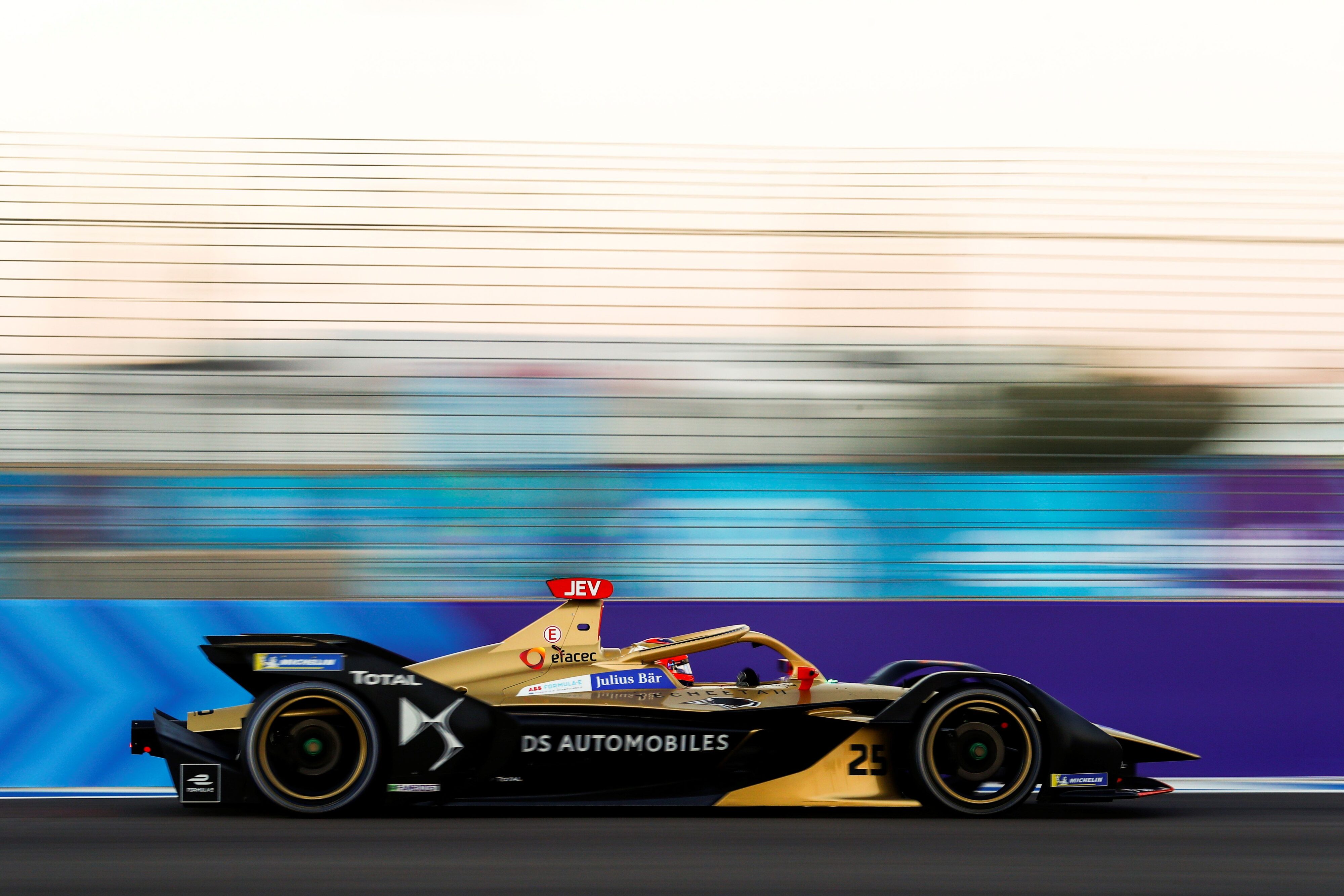 A photo of Jean-Eric Vergne's DS Automobiles Formula E racecar in motion.