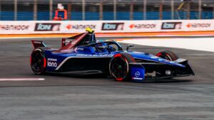 Photo of a Maserati MSG Racing Formula E car mid race.