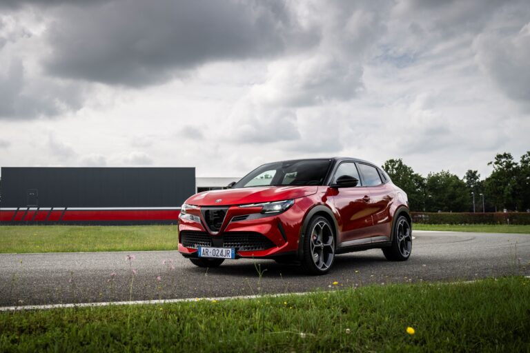 Front three quarters view of a 2025 Alfa Romeo Junior in Red.
