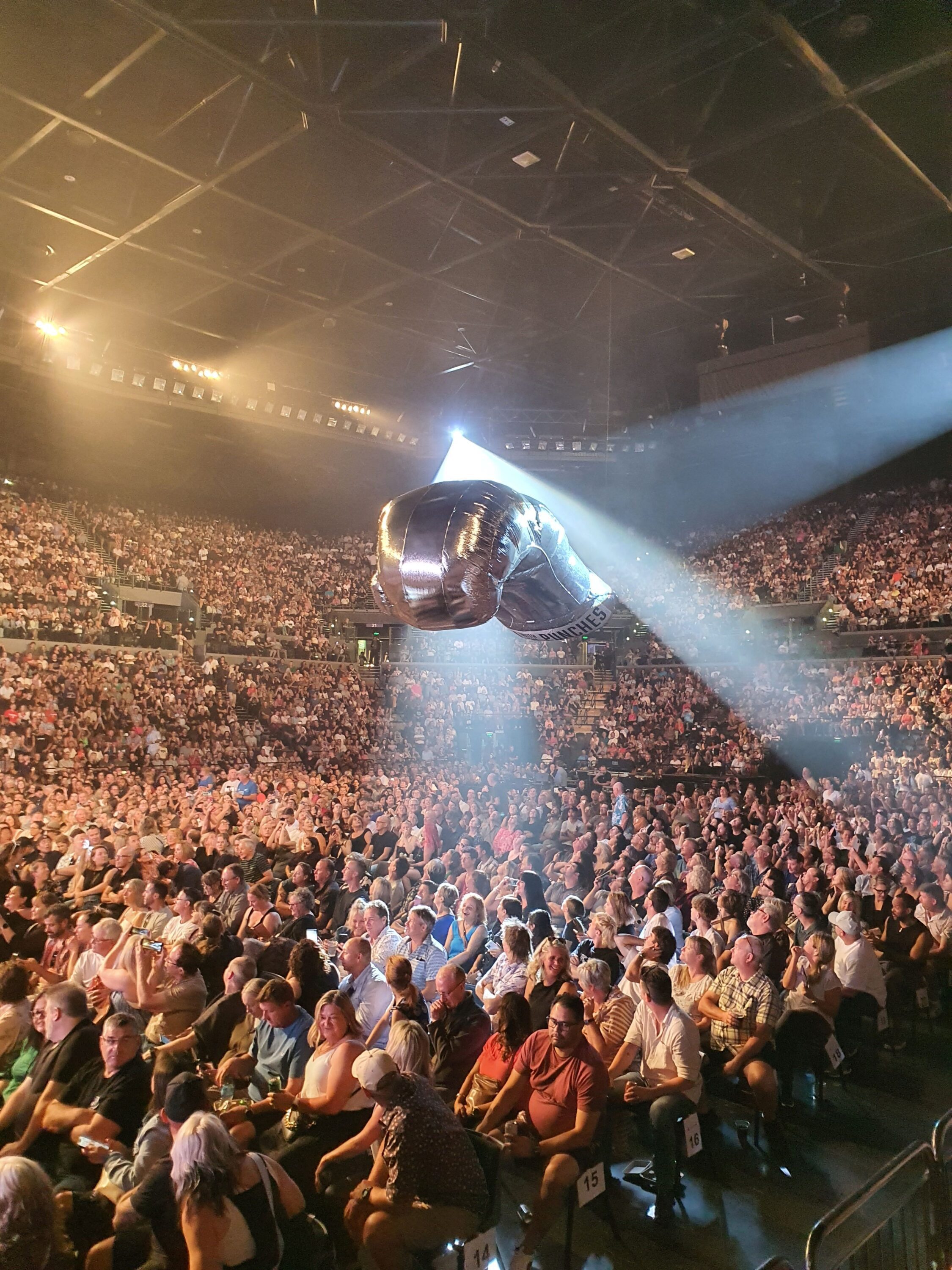 An inflated glove sporting the words 'Roll With The Punches' at Spark Arena, Auckland as part of Bryan Adams' So Happy It Hurts World Tour 2025.