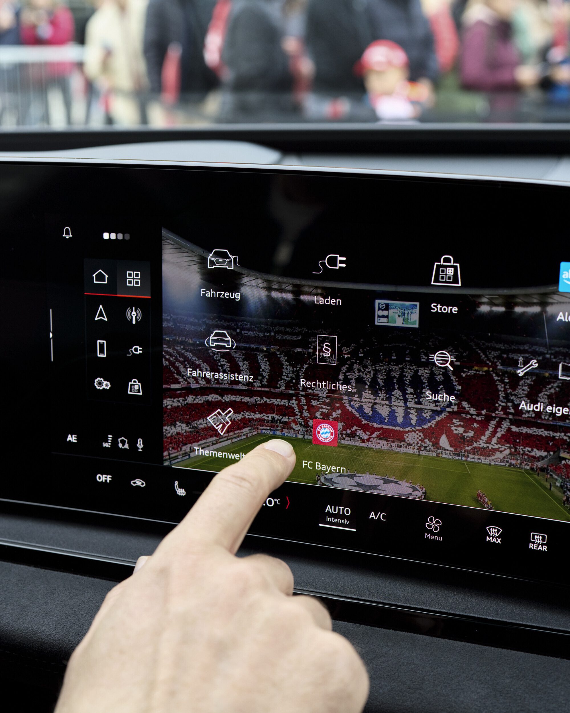 A preview of the new Audi MMI interface with the FC Bayern Munich app included.
