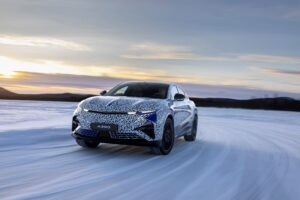 Alpine A390 under camouflage, testing in the Arctic Circle. Front three quarters view of the car in motion.