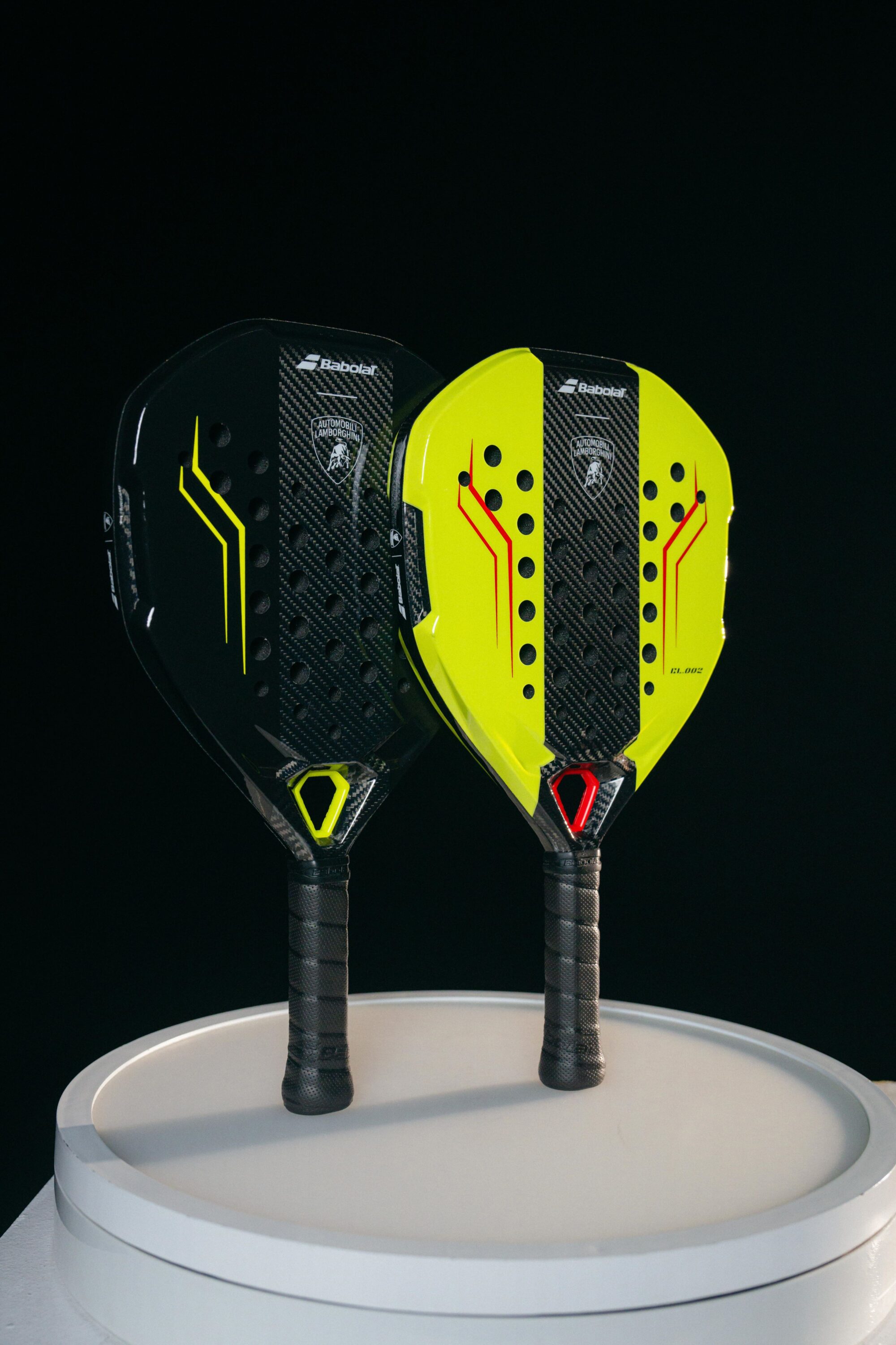 A photo of the Lamborghini Babolat BL002 padel racquet in black and green.