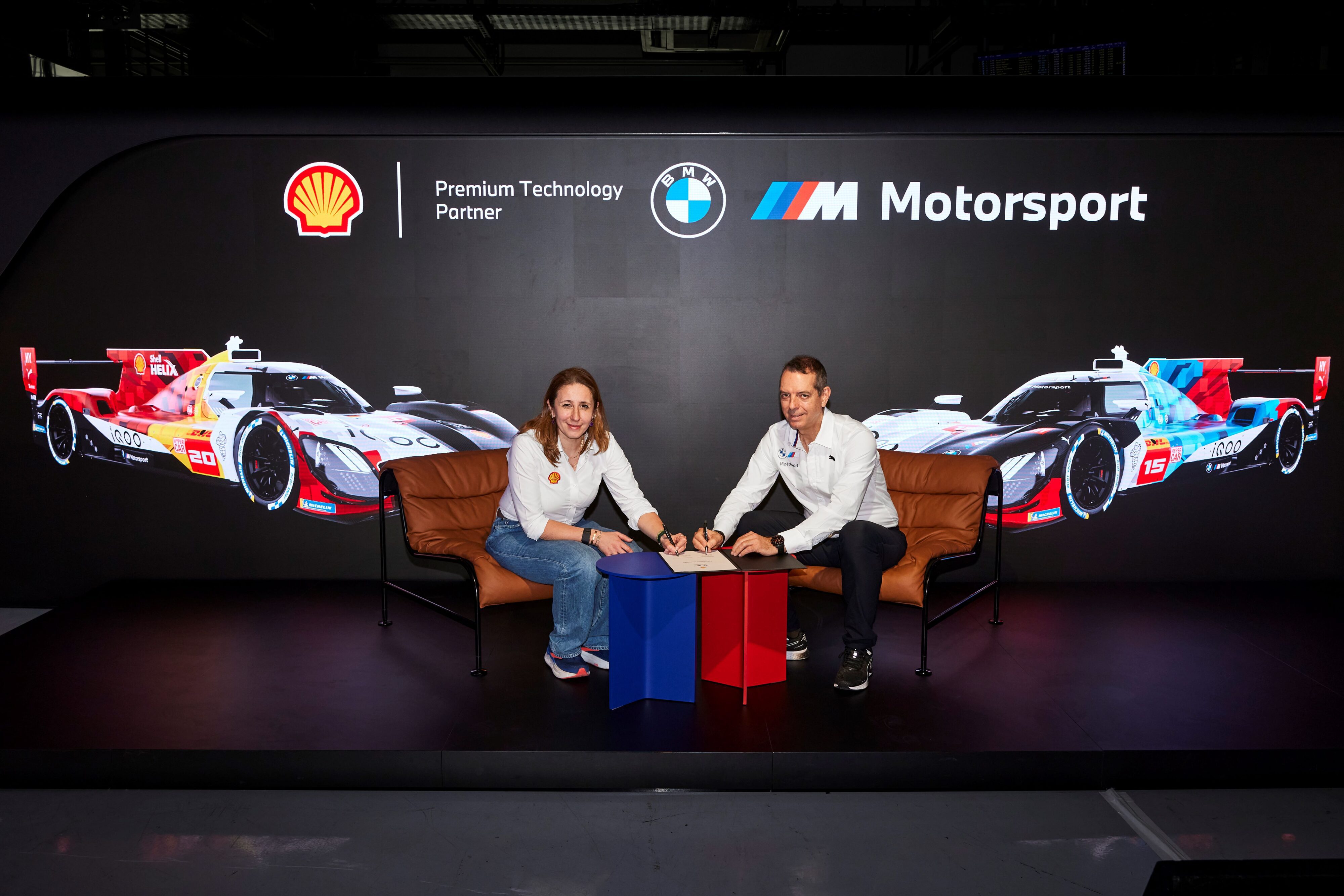 Aysun Akik of Shell Lubricants and Franciscus van Meel of BMW M Motorsport pictured signing the new contract.