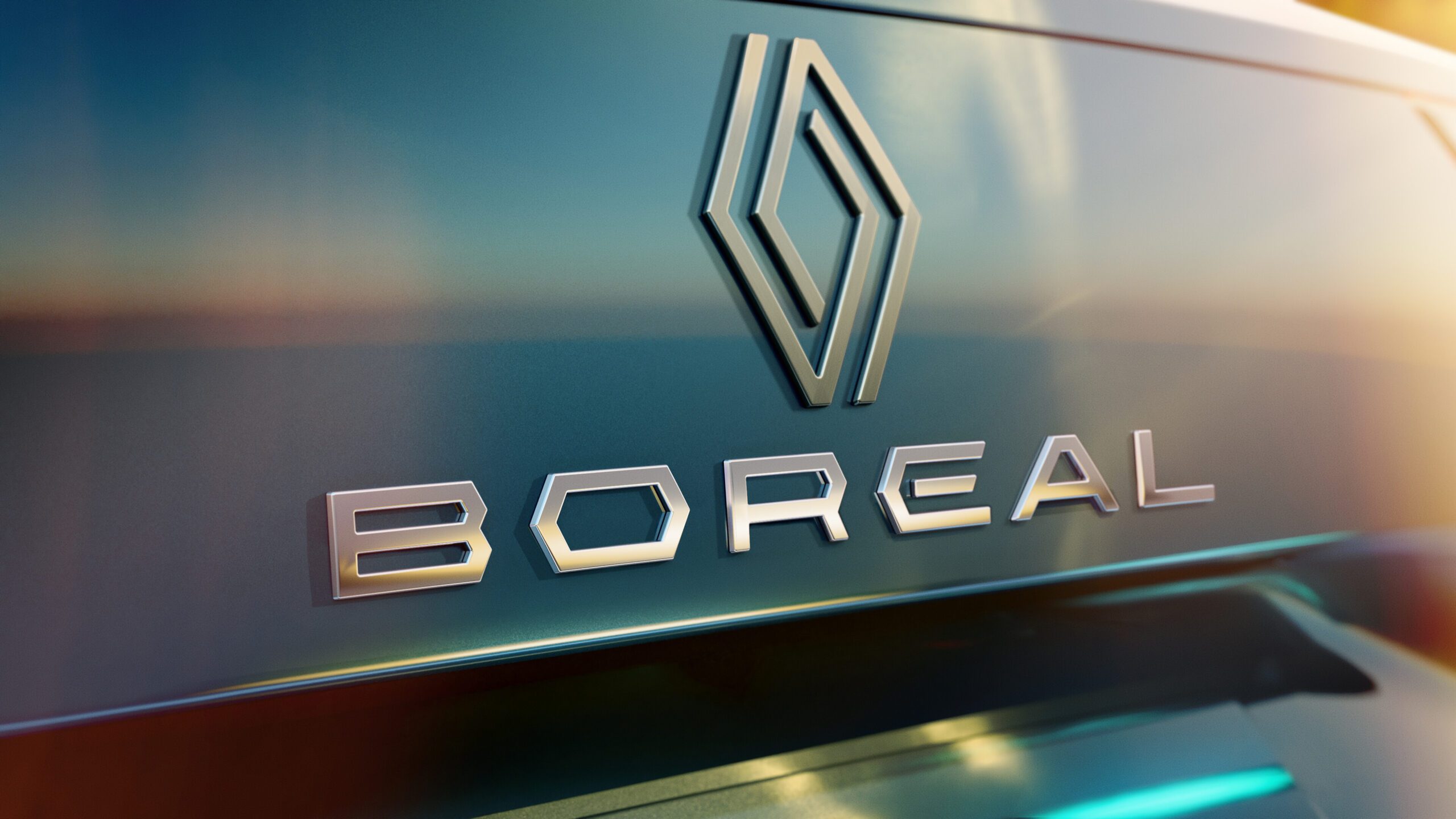 A close up photo of the Renault and Boreal logos on the back on the new car.