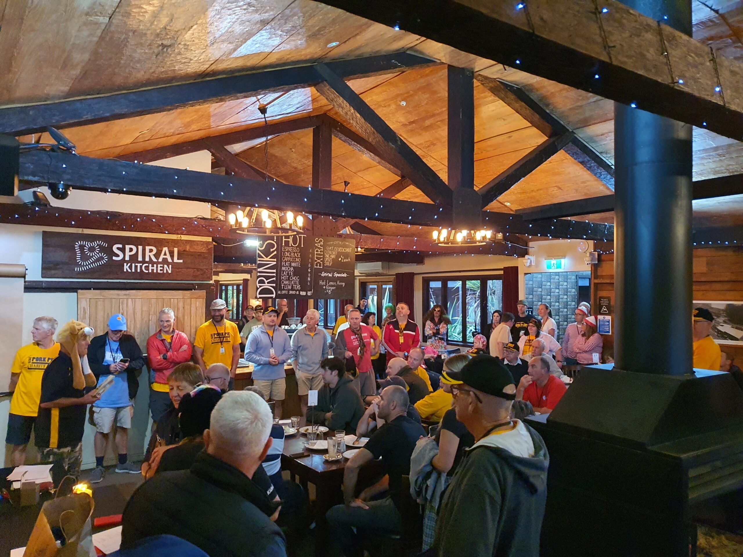 Mini owners gathered in the restaurant at the briefing on day two of the 2025 Pork Pie Charity Run.