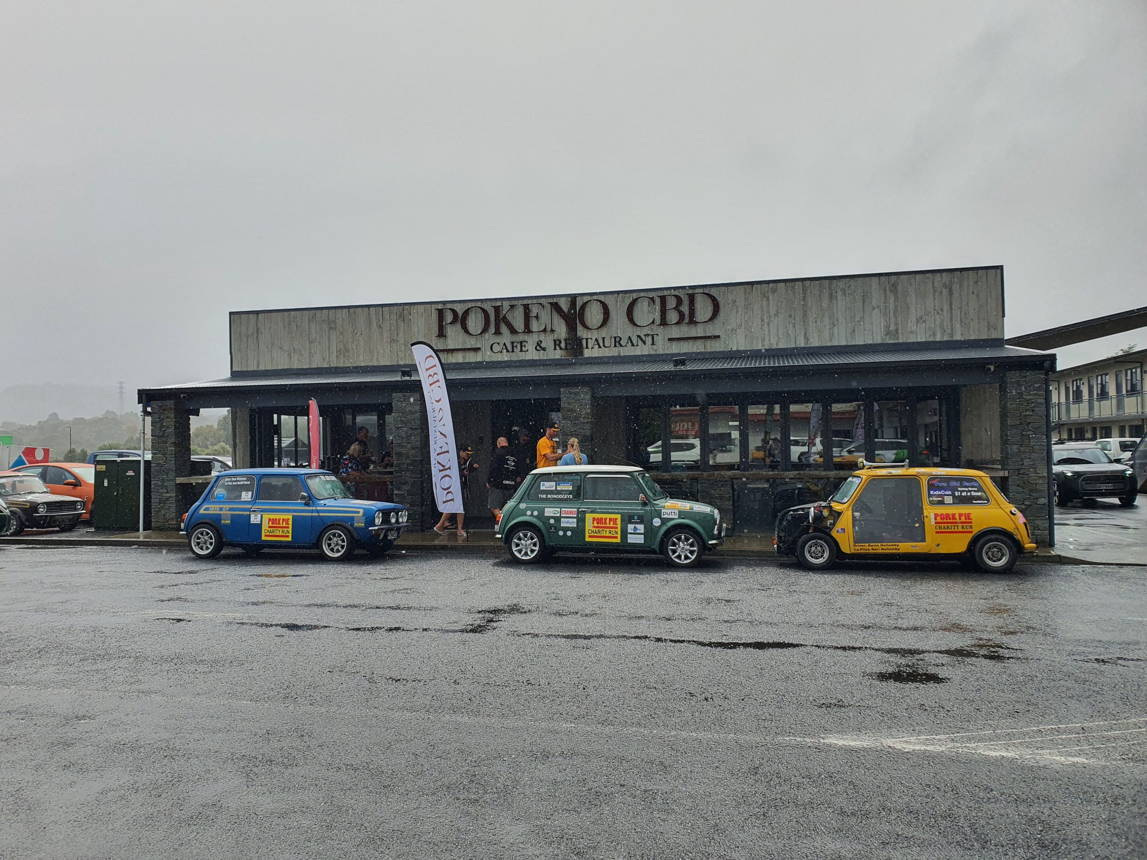 A trio of Minis parked outside Pokeno CBD in Pokeno, Waikato on day one of the 2025 Pork Pie Charity Run.