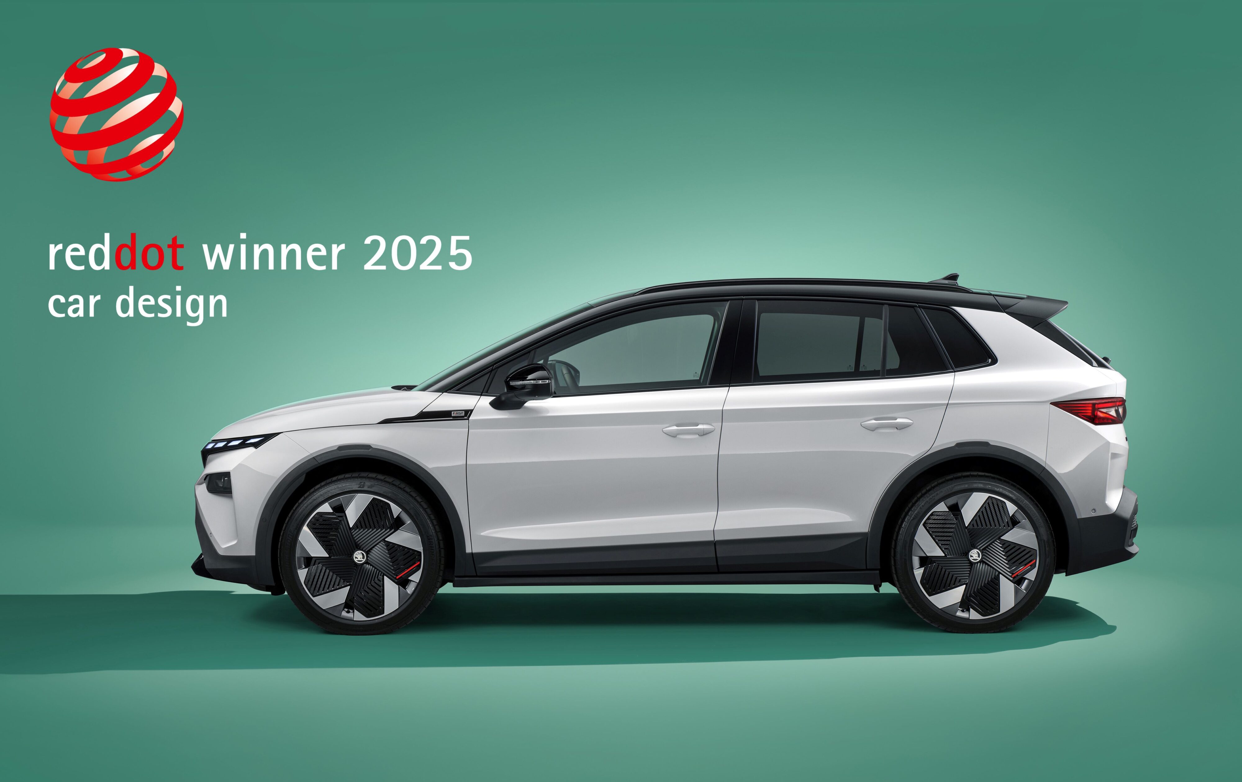 Side on view of a white/black Skoda Elroq with its 2025 Red Design Award stamp in the top left.