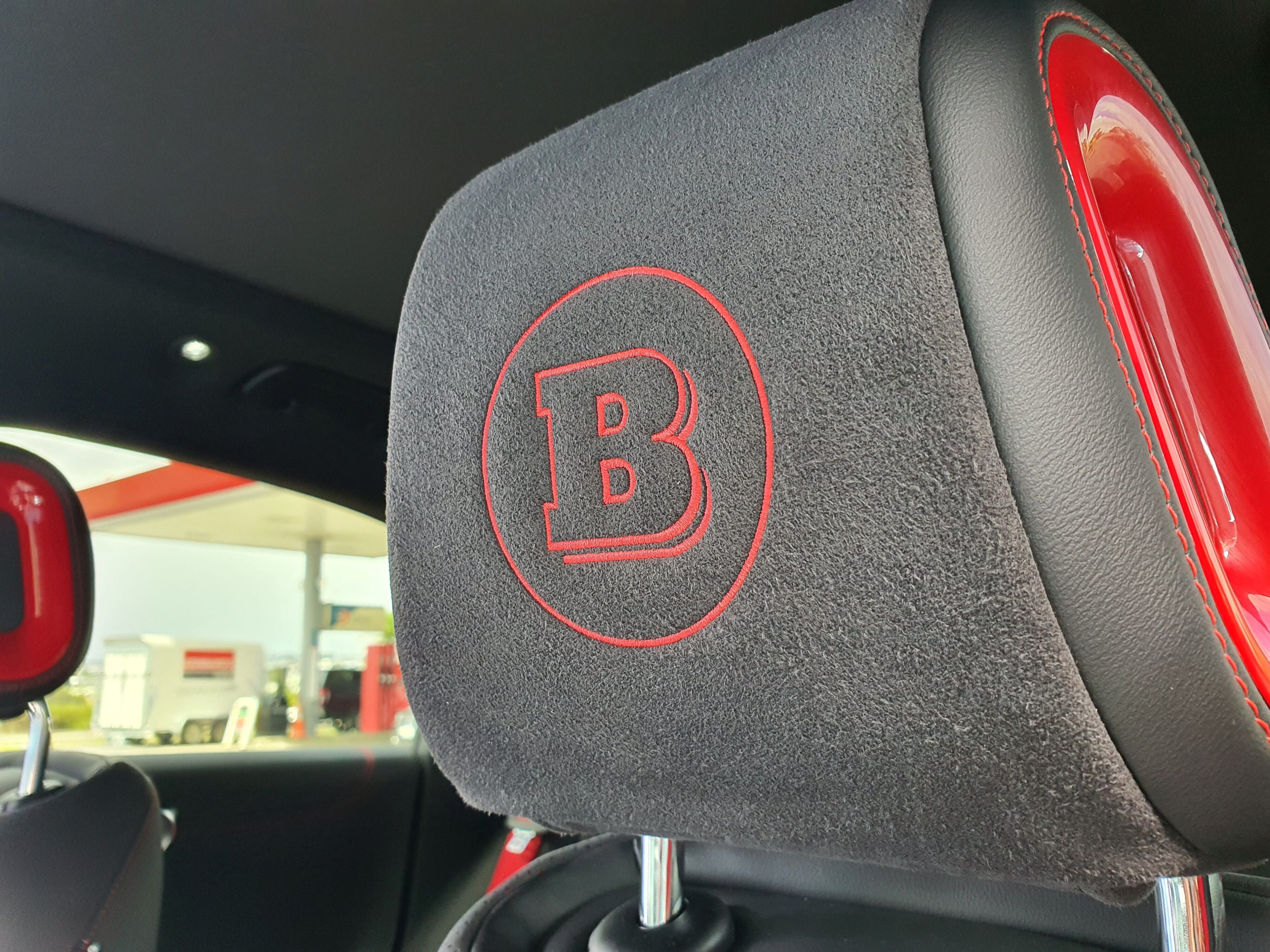 Red Brabus badging on the headrests of a smart #1 Brabus.