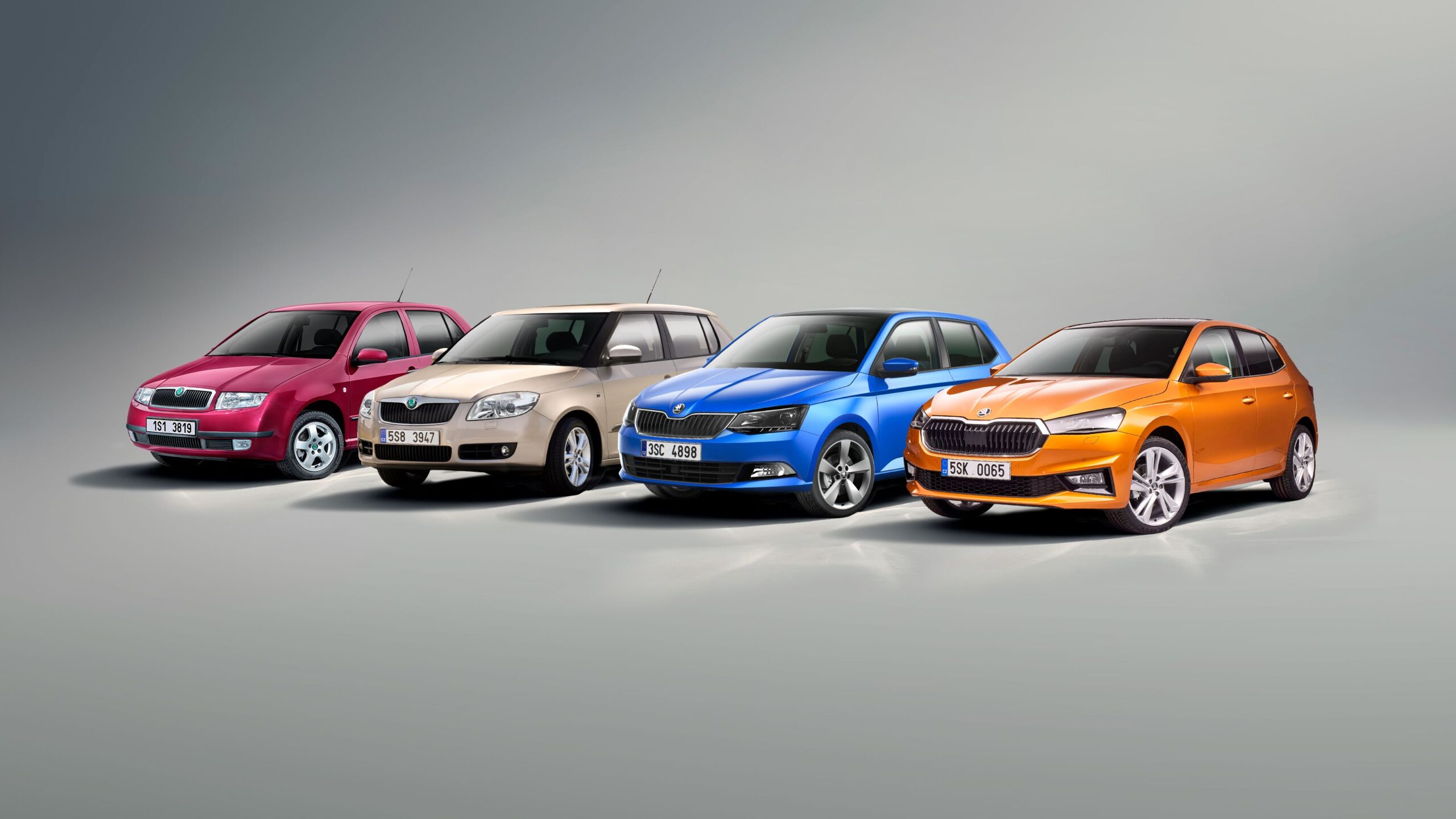 A photo of the four different generations of Skoda Fabias.