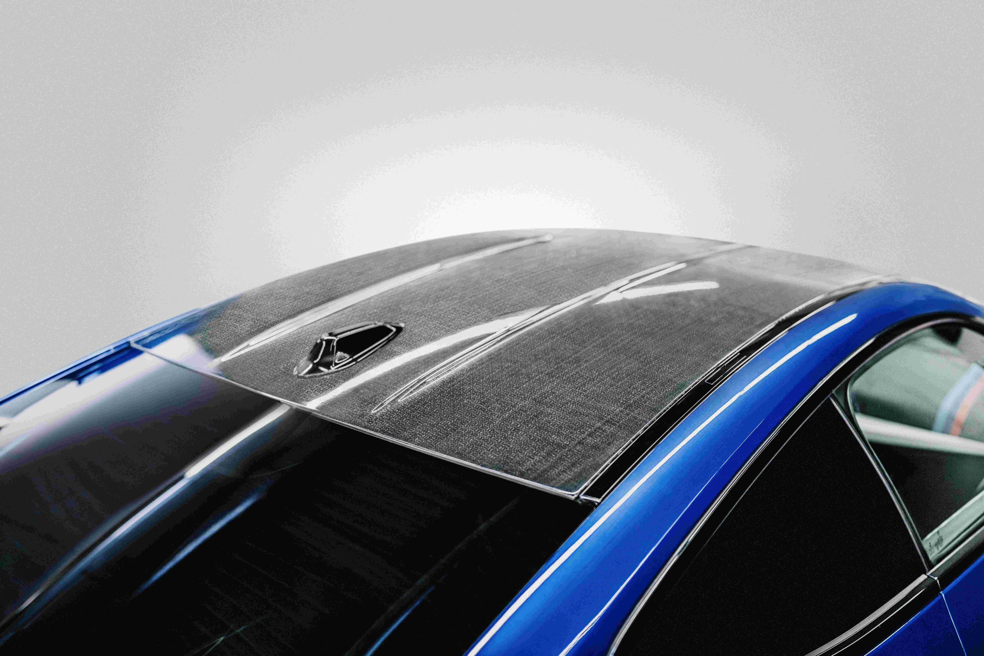 Carbon Fibre begone - BMW go natural