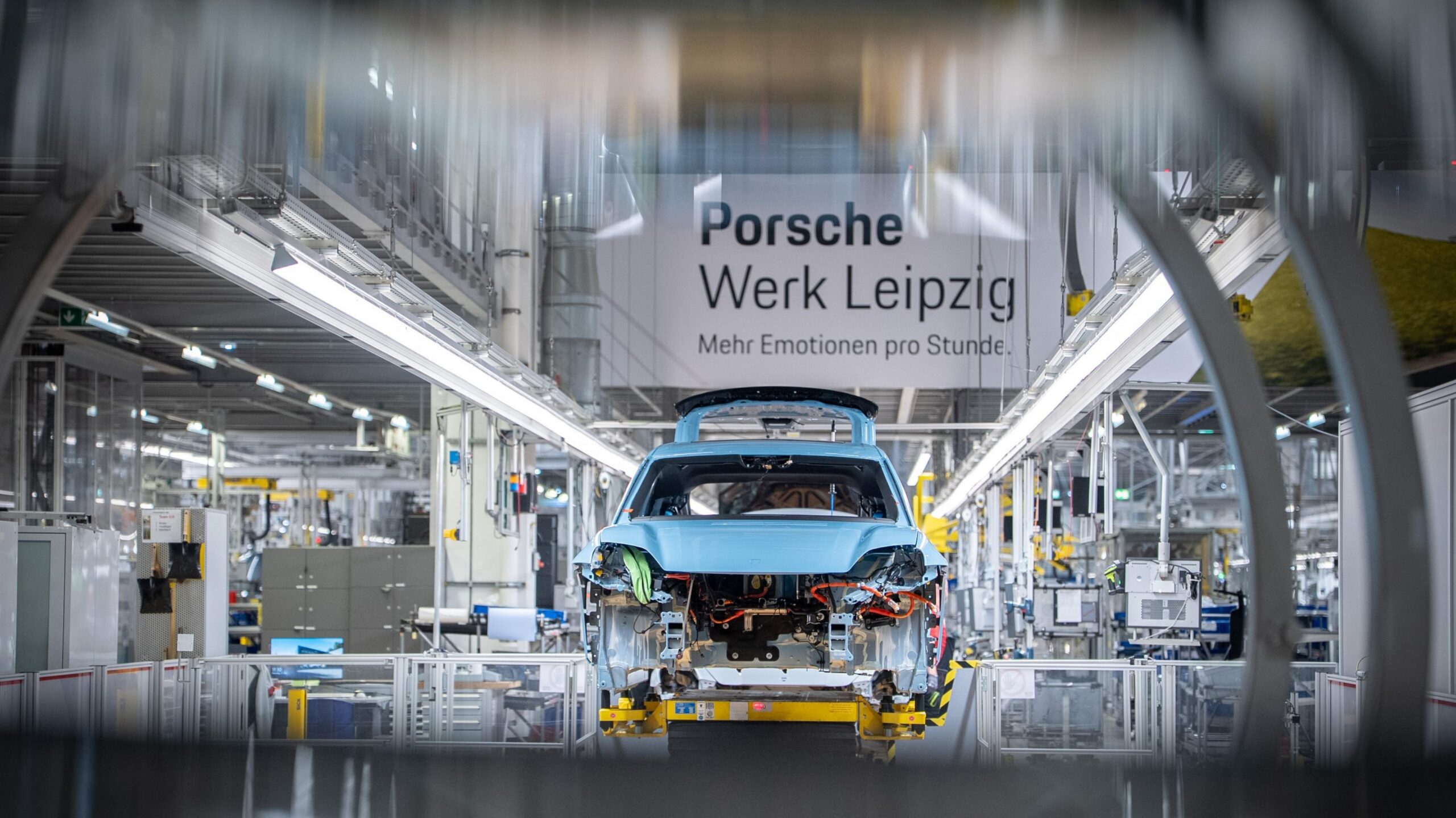 A baby blue Porsche Macan 4S going through the production line at Porsche's plant in Leipzig, Germany.